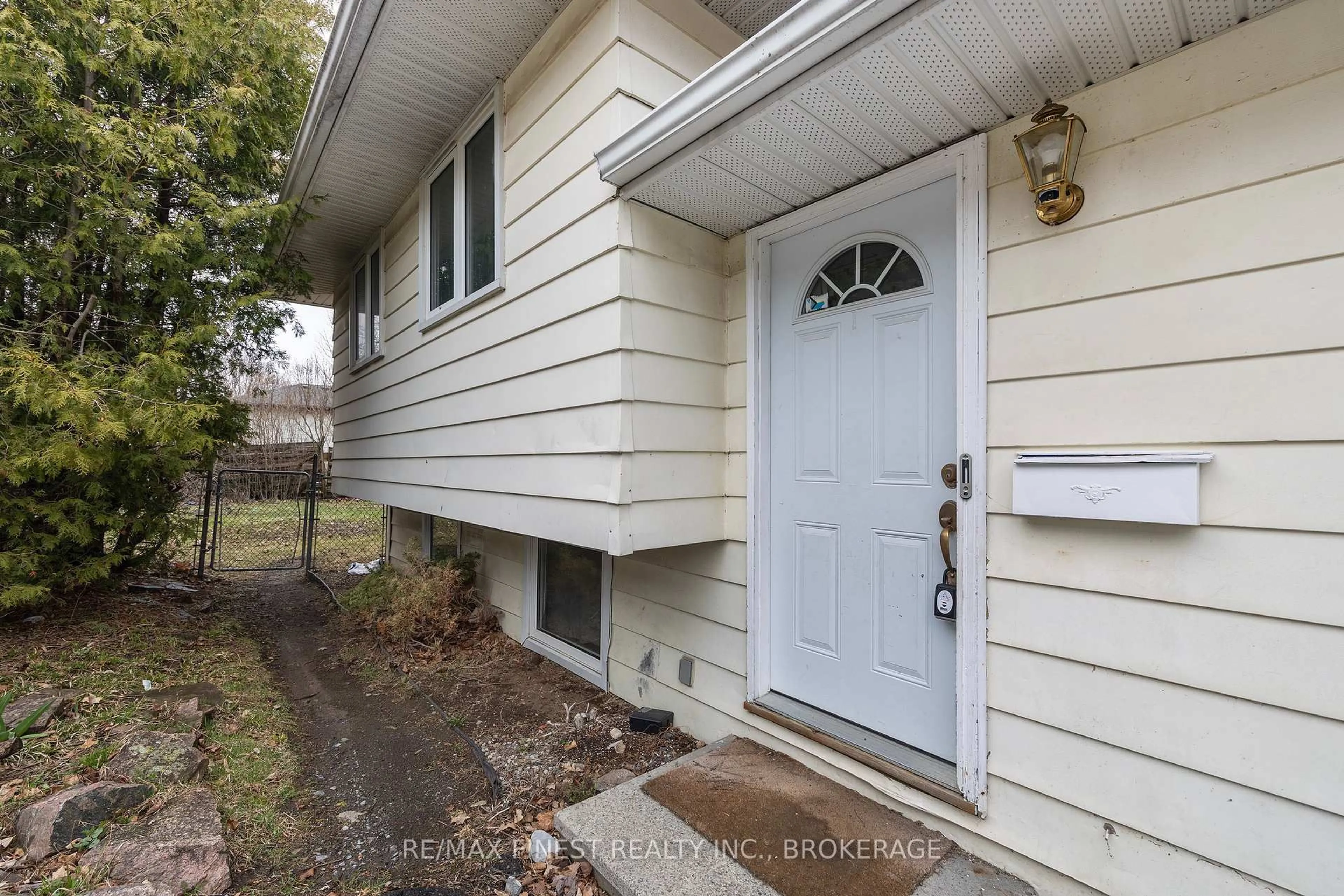 Home with vinyl exterior material, street for 20 FOSTER St, Kingston Ontario K7M 6L6