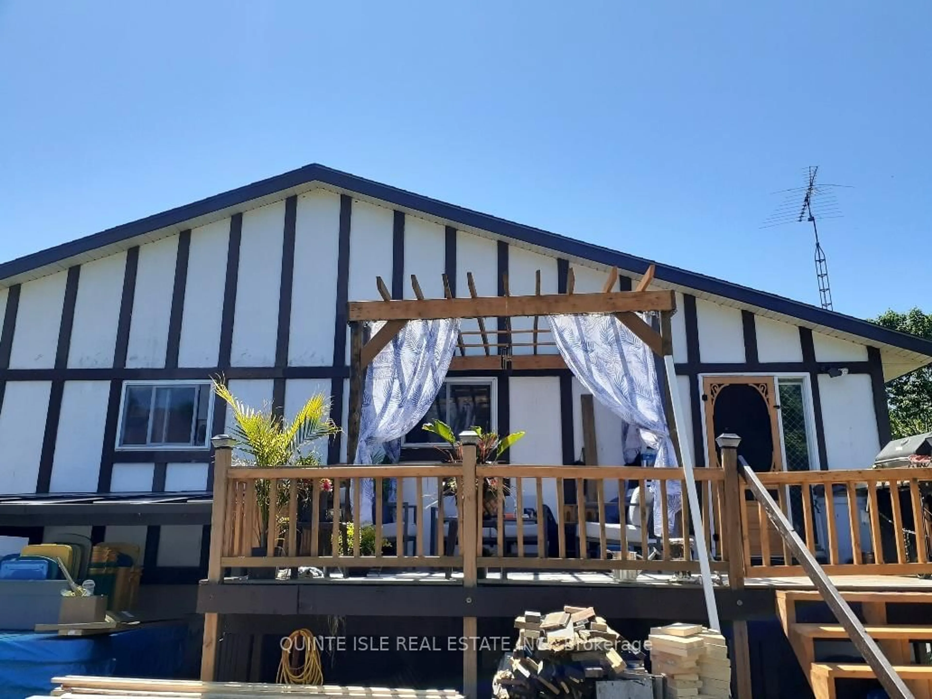 A pic from outside/outdoor area/front of a property/back of a property/a pic from drone, water/lake/river/ocean view for 106B Main St, Prince Edward County Ontario K0K 3L0