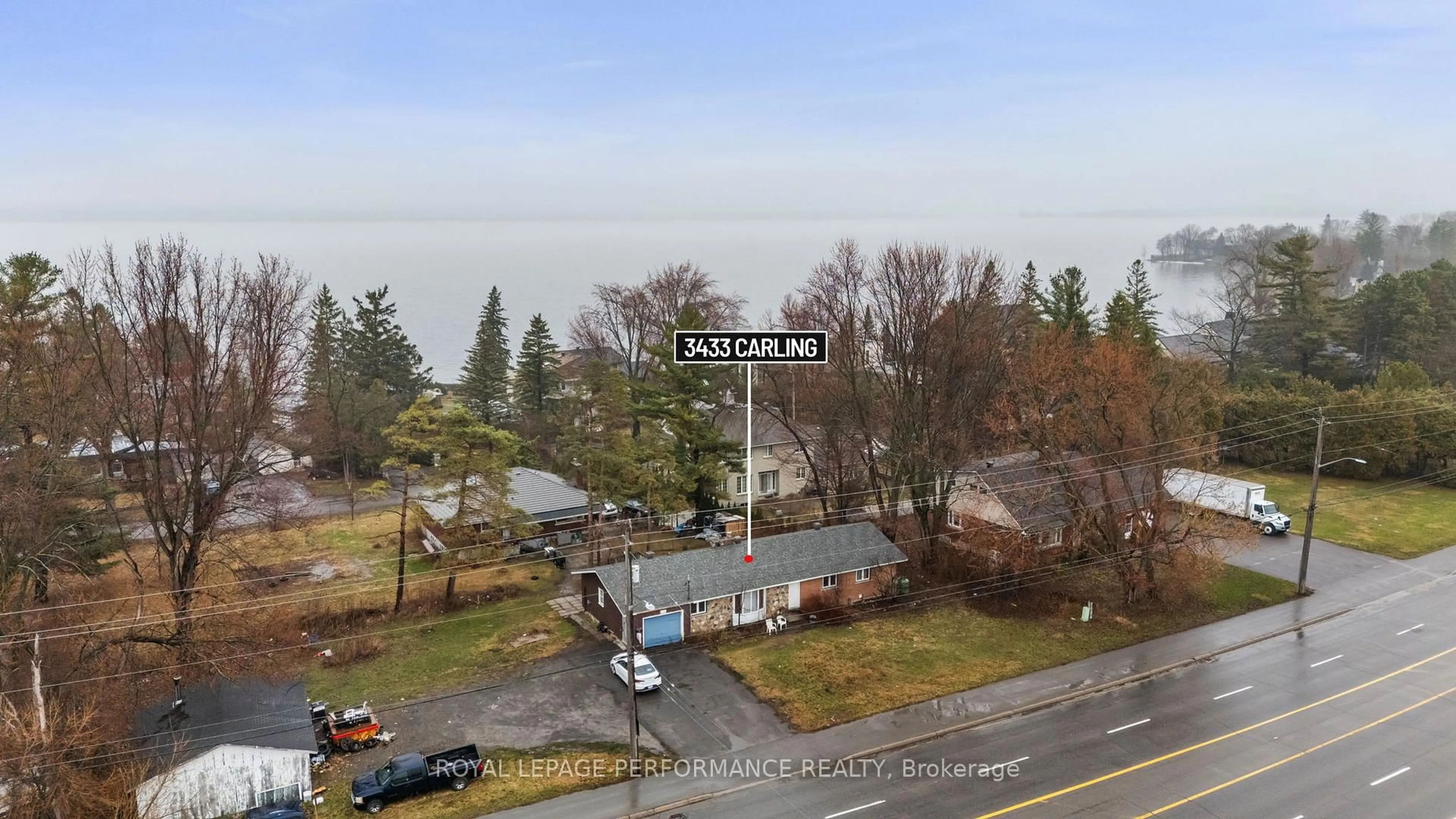 A pic from outside/outdoor area/front of a property/back of a property/a pic from drone, unknown for 3433 Carling Ave, Ottawa Ontario K2H 7V5