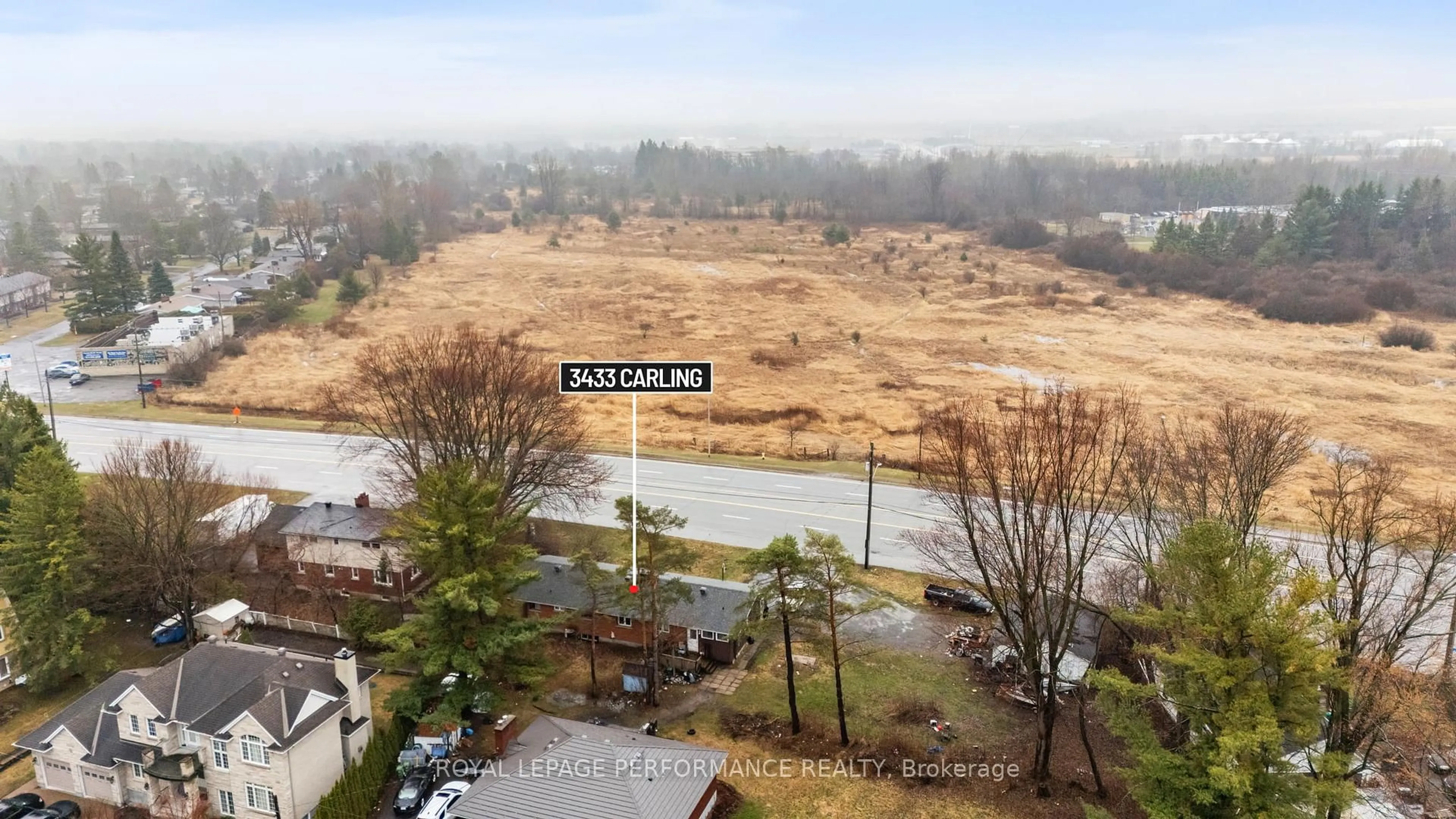 A pic from outside/outdoor area/front of a property/back of a property/a pic from drone, water/lake/river/ocean view for 3433 Carling Ave, Ottawa Ontario K2H 7V5