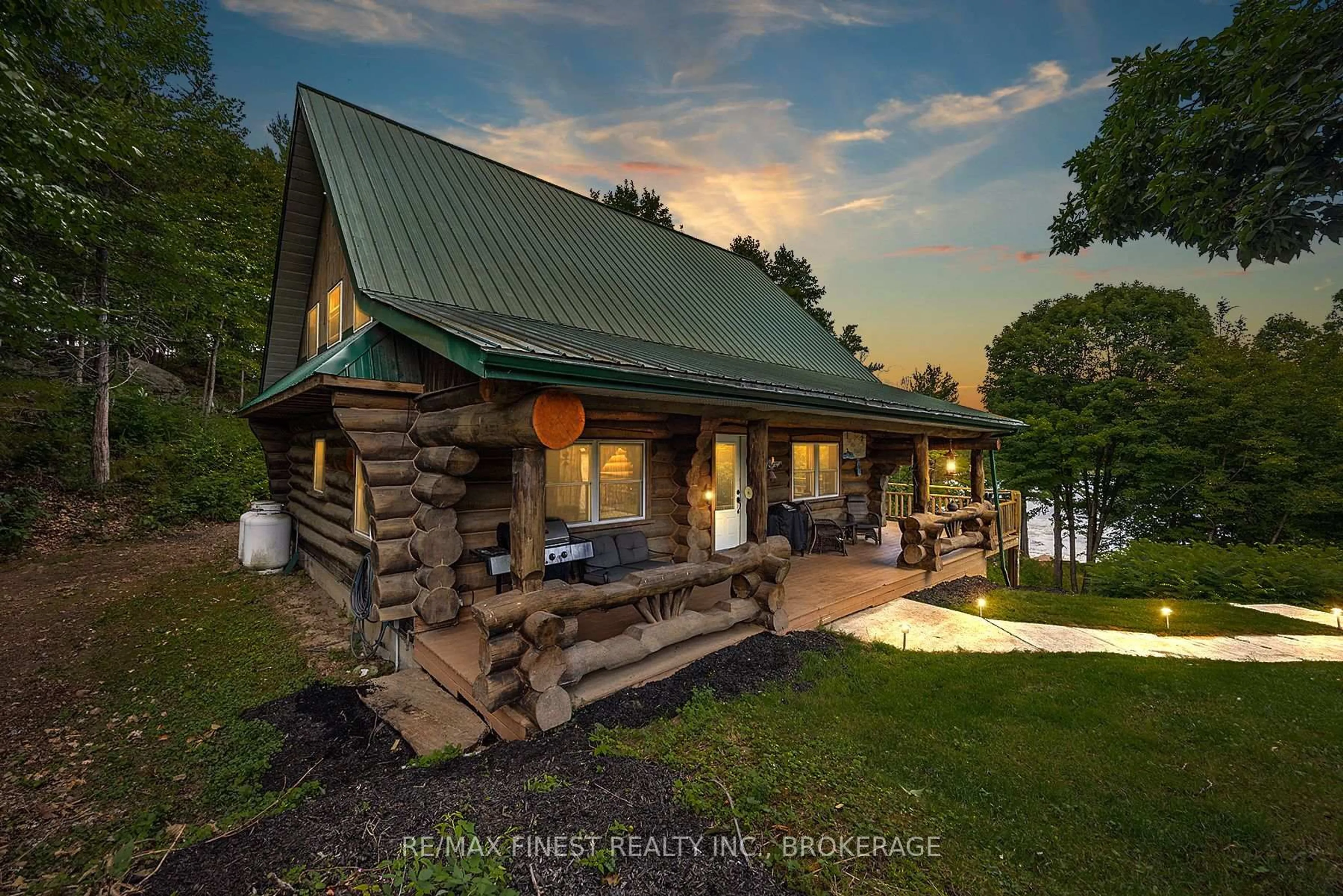 A pic from outside/outdoor area/front of a property/back of a property/a pic from drone, water/lake/river/ocean view for 7679 Perth Rd, Perth Road Ontario K0H 2L0