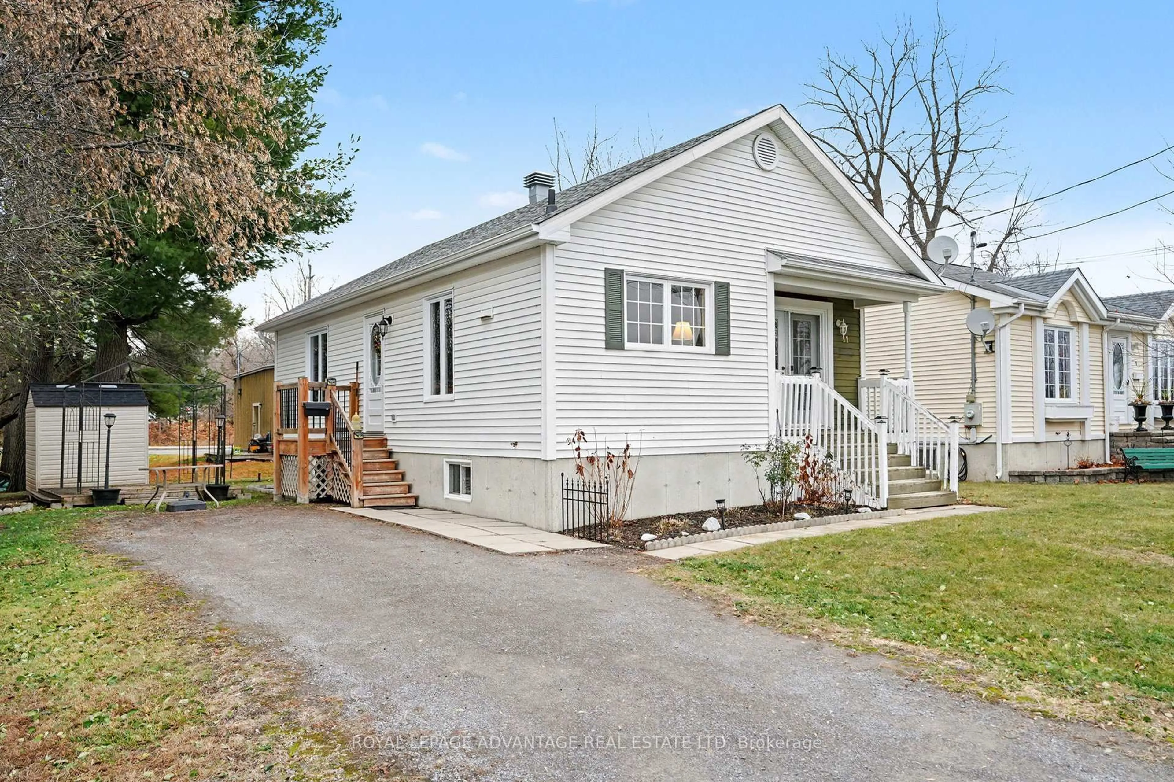 Home with vinyl exterior material, street for 11 Queen St, Perth Ontario K7H 2W4