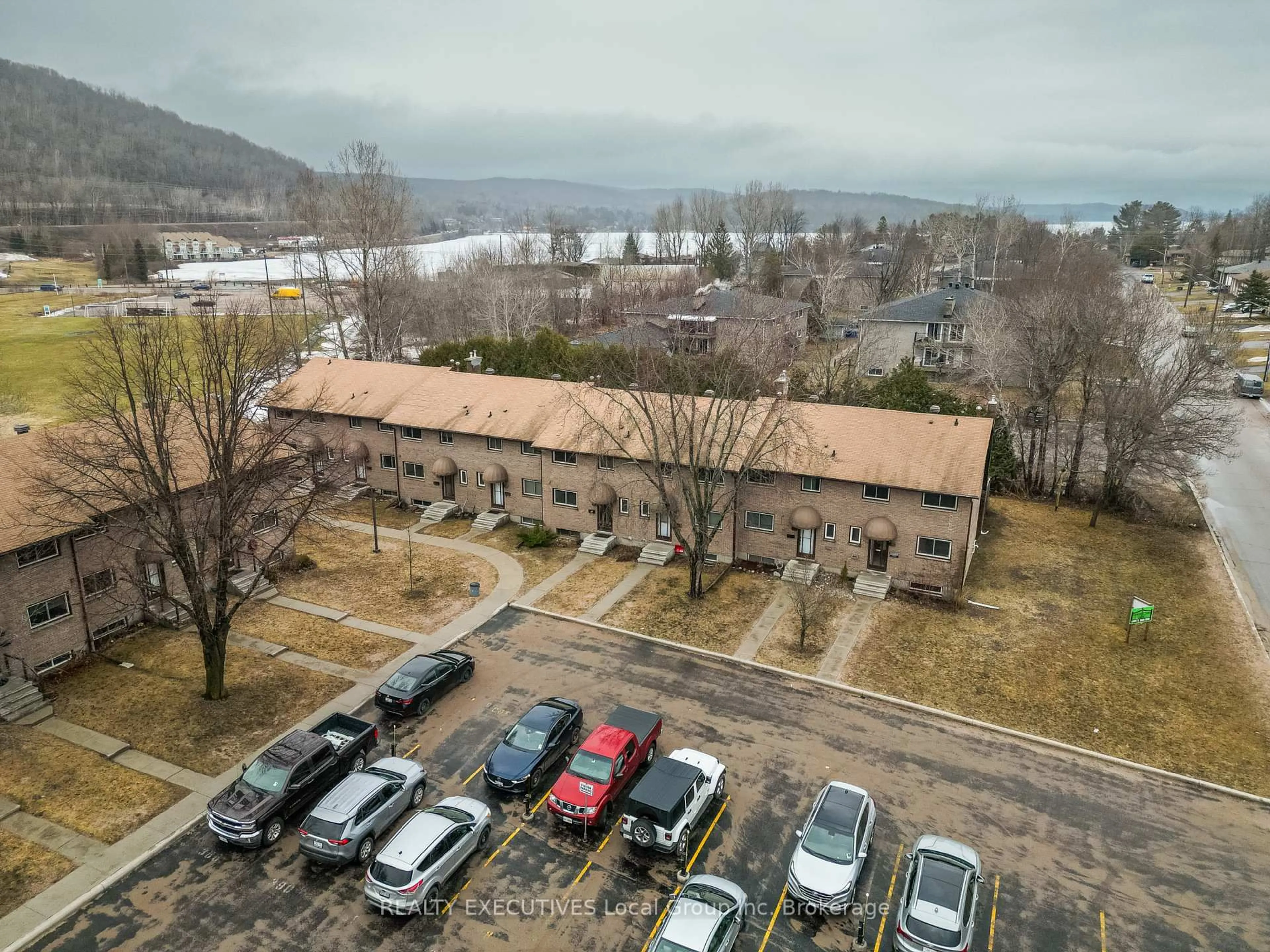 A pic from outside/outdoor area/front of a property/back of a property/a pic from drone, mountain view for 398 Wickstead Ave #36, North Bay Ontario P1A 3L8