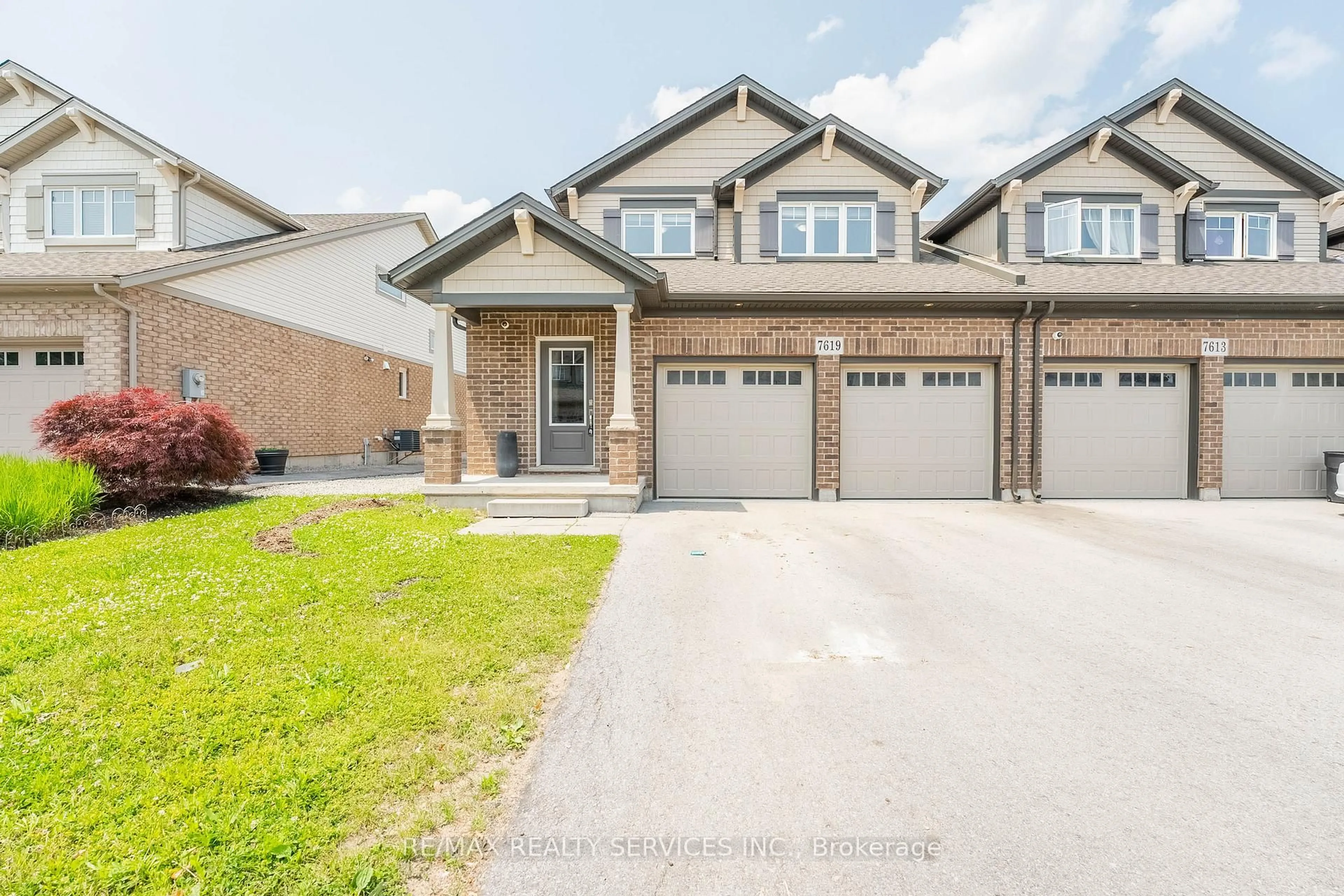Home with brick exterior material, street for 7619 Green Vista Gate, Niagara Falls Ontario L2G 0A8