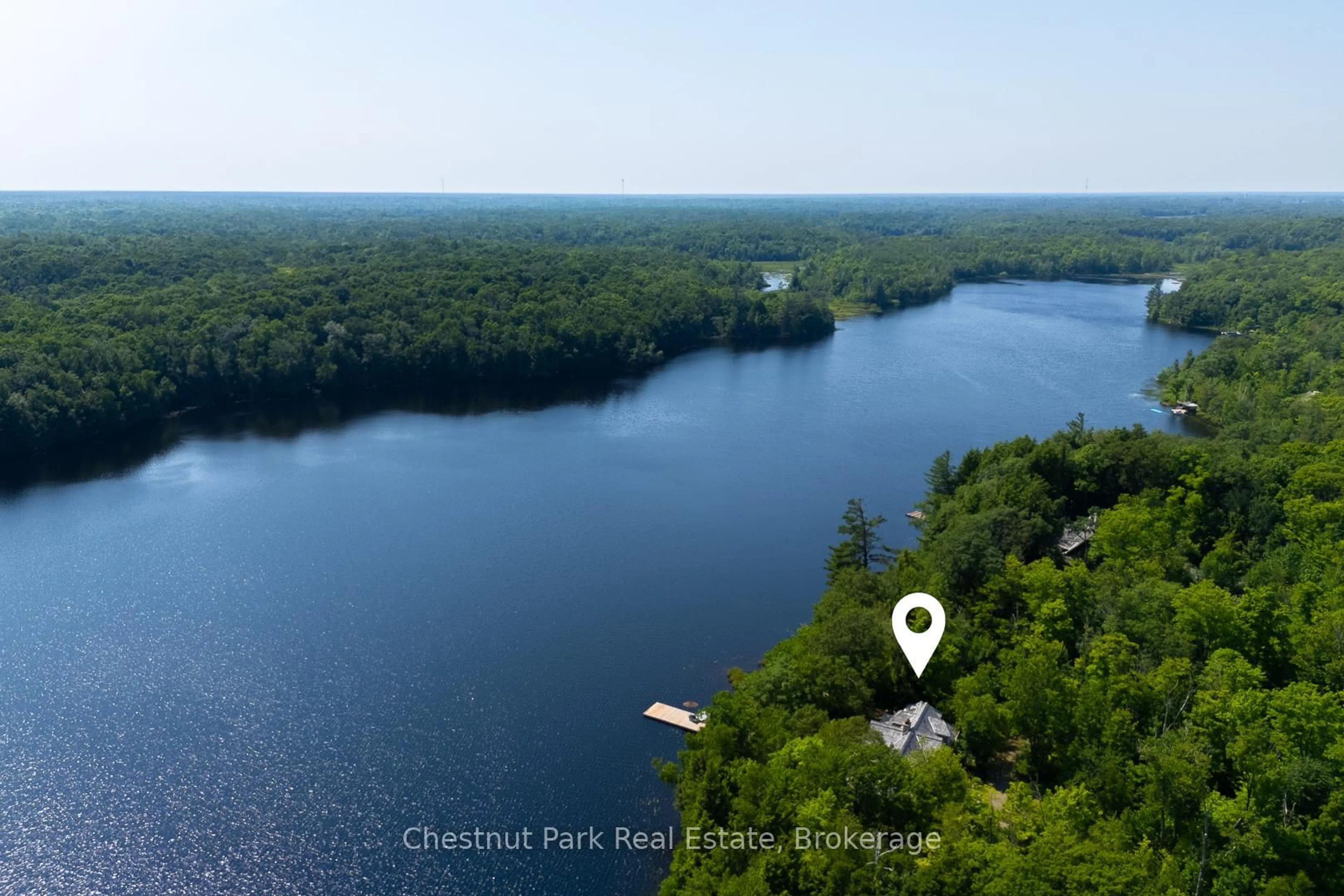 A pic from outside/outdoor area/front of a property/back of a property/a pic from drone, water/lake/river/ocean view for 4805 Muskoka 169 Rd #Unit #17, Muskoka Lakes Ontario P0B 1H0
