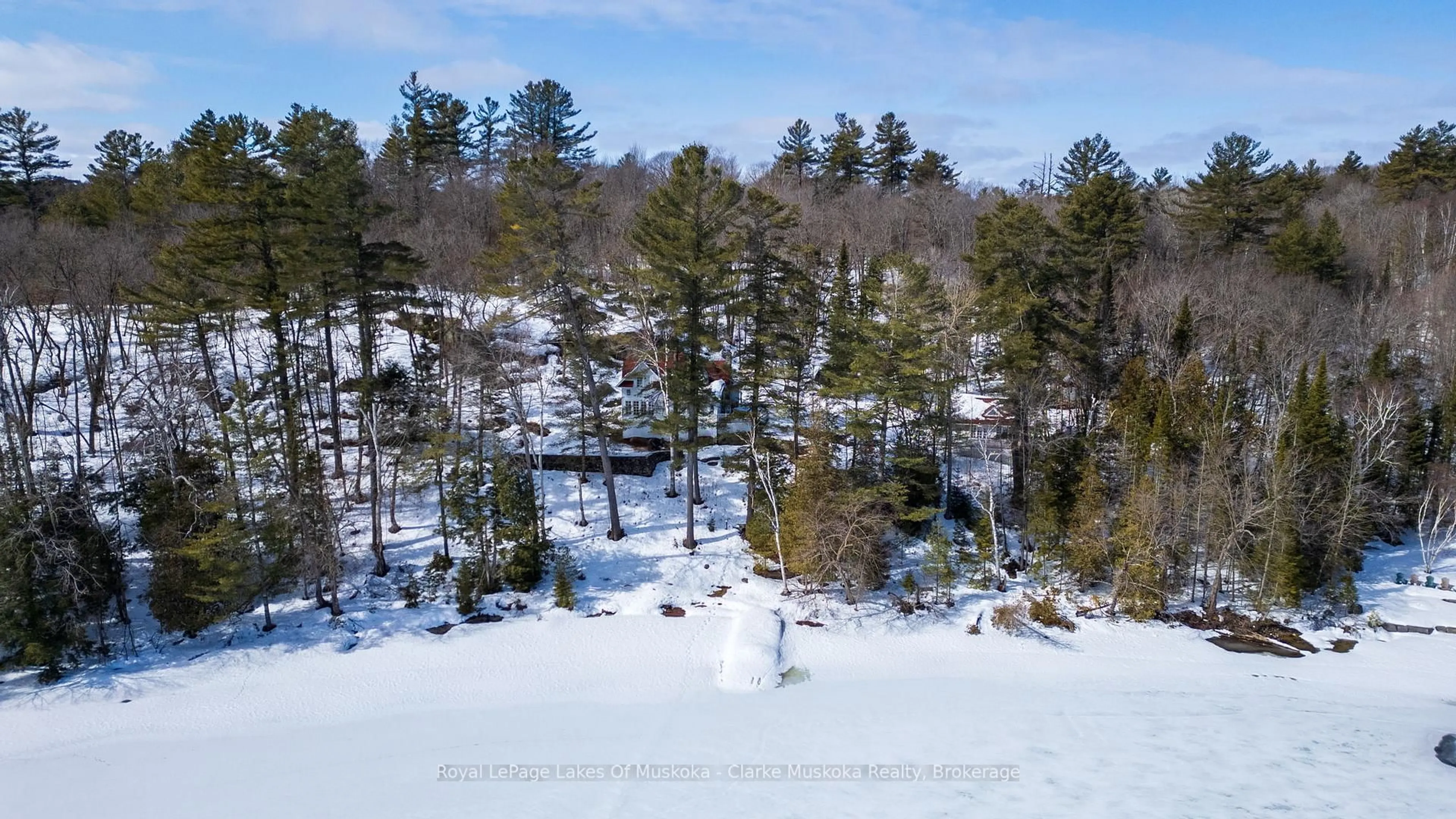 A pic from outside/outdoor area/front of a property/back of a property/a pic from drone, forest/trees view for 250 & 252 Clear Lake Rd, Seguin Ontario P2A 2W8