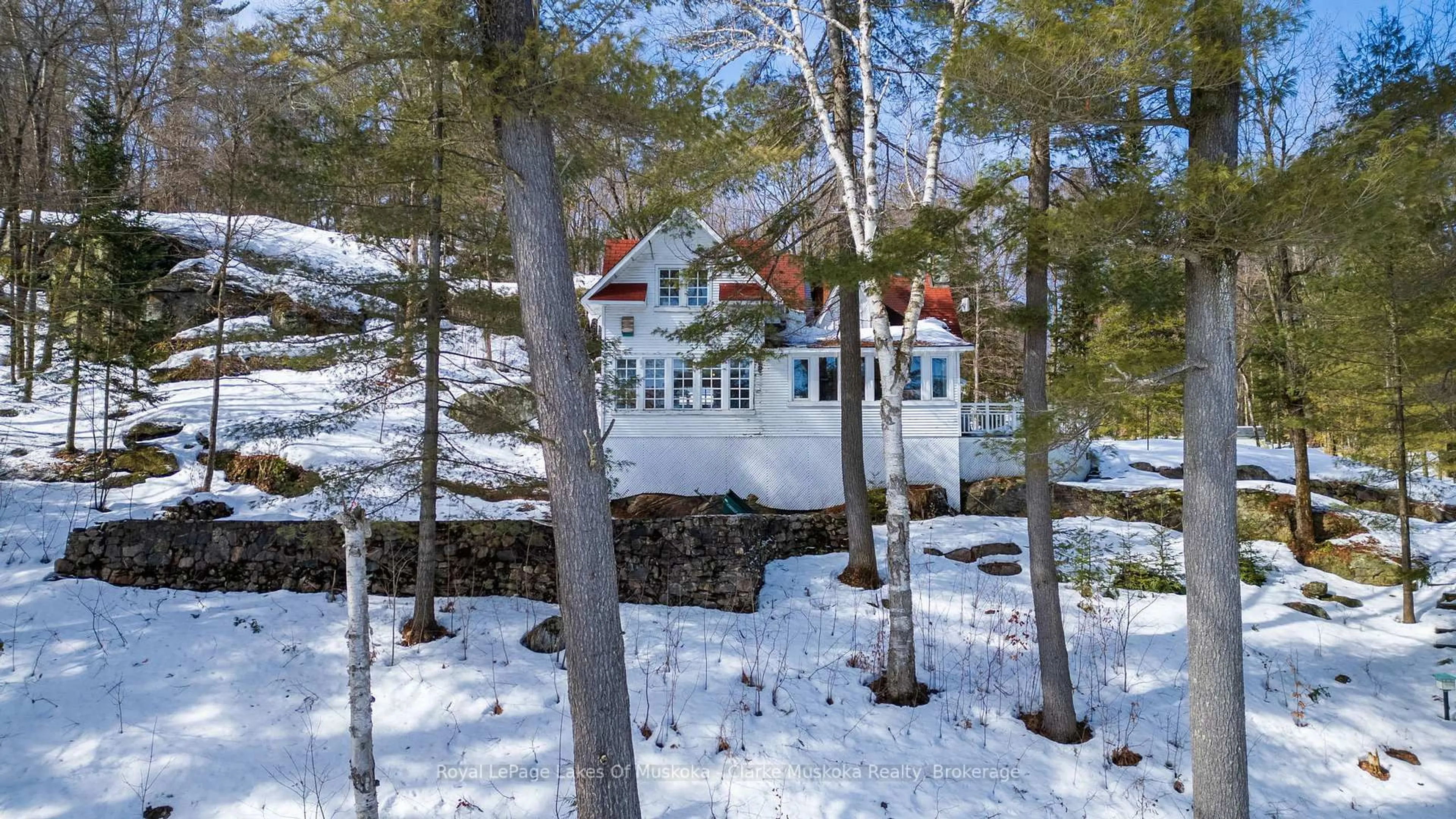 A pic from outside/outdoor area/front of a property/back of a property/a pic from drone, water/lake/river/ocean view for 250 & 252 Clear Lake Rd, Seguin Ontario P2A 2W8