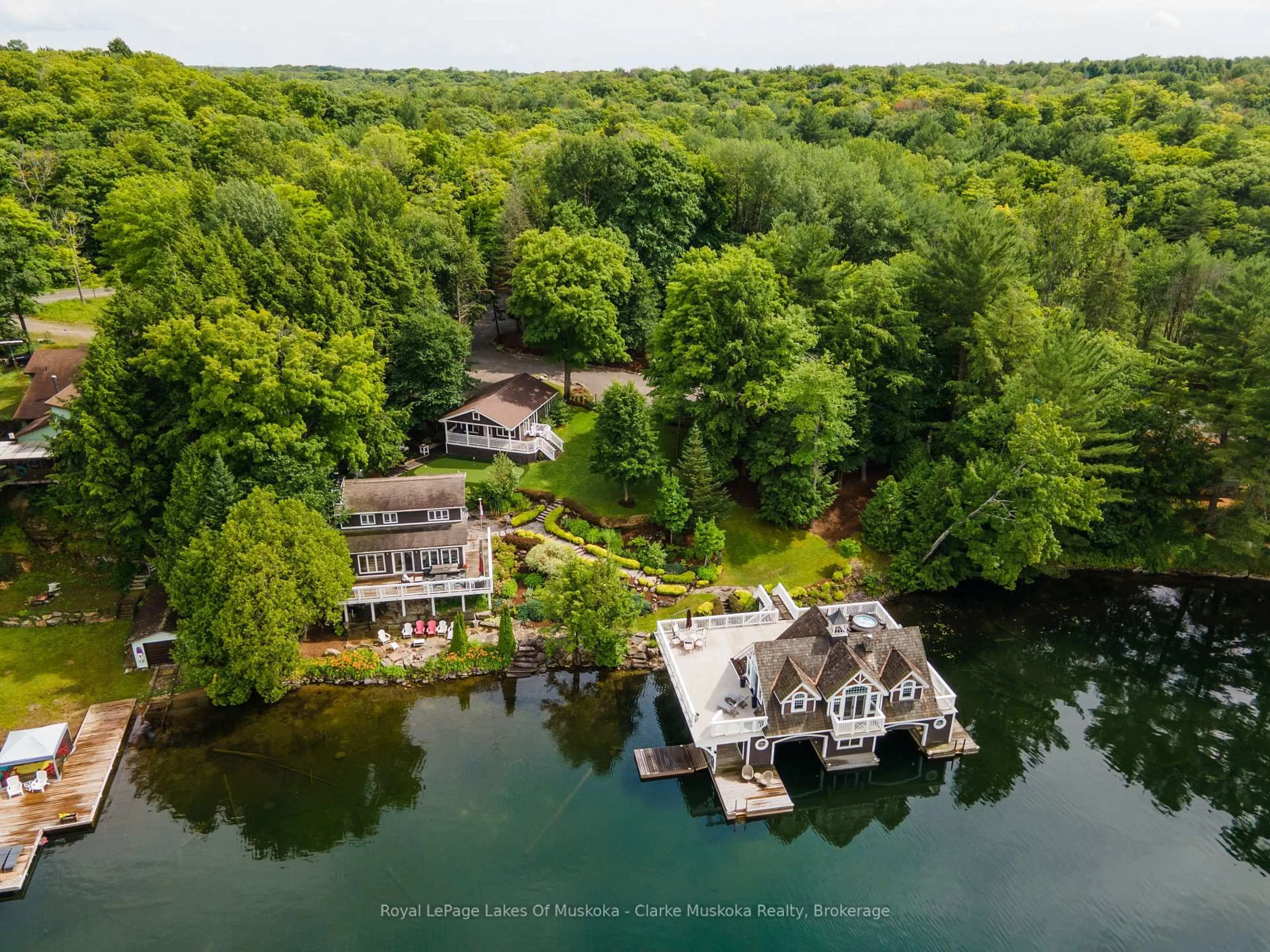 A pic from outside/outdoor area/front of a property/back of a property/a pic from drone, water/lake/river/ocean view for 1027 CHOWN Rd, Muskoka Lakes Ontario P0C 1H0