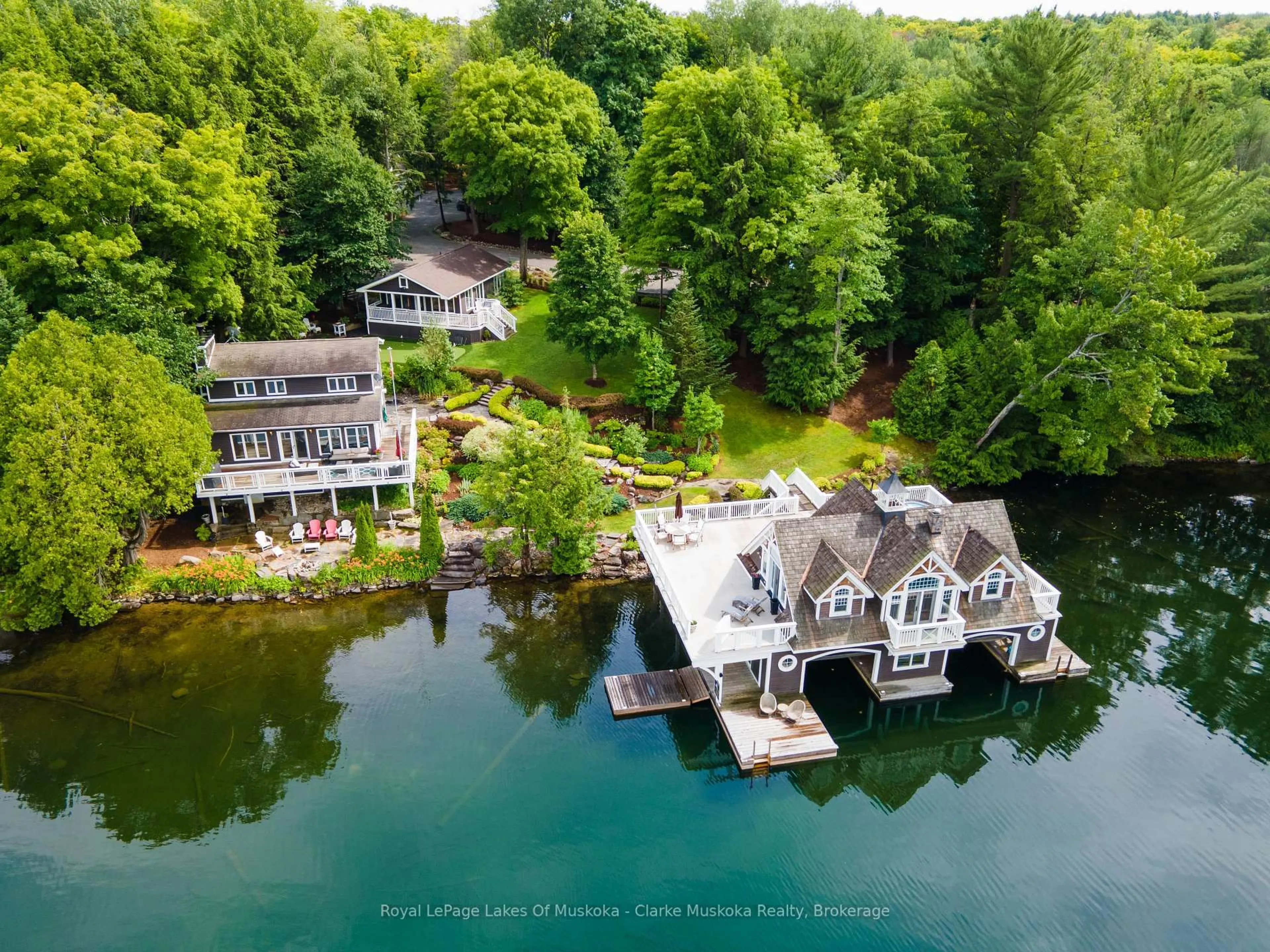 A pic from outside/outdoor area/front of a property/back of a property/a pic from drone, water/lake/river/ocean view for 1027 CHOWN Rd, Muskoka Lakes Ontario P0C 1H0