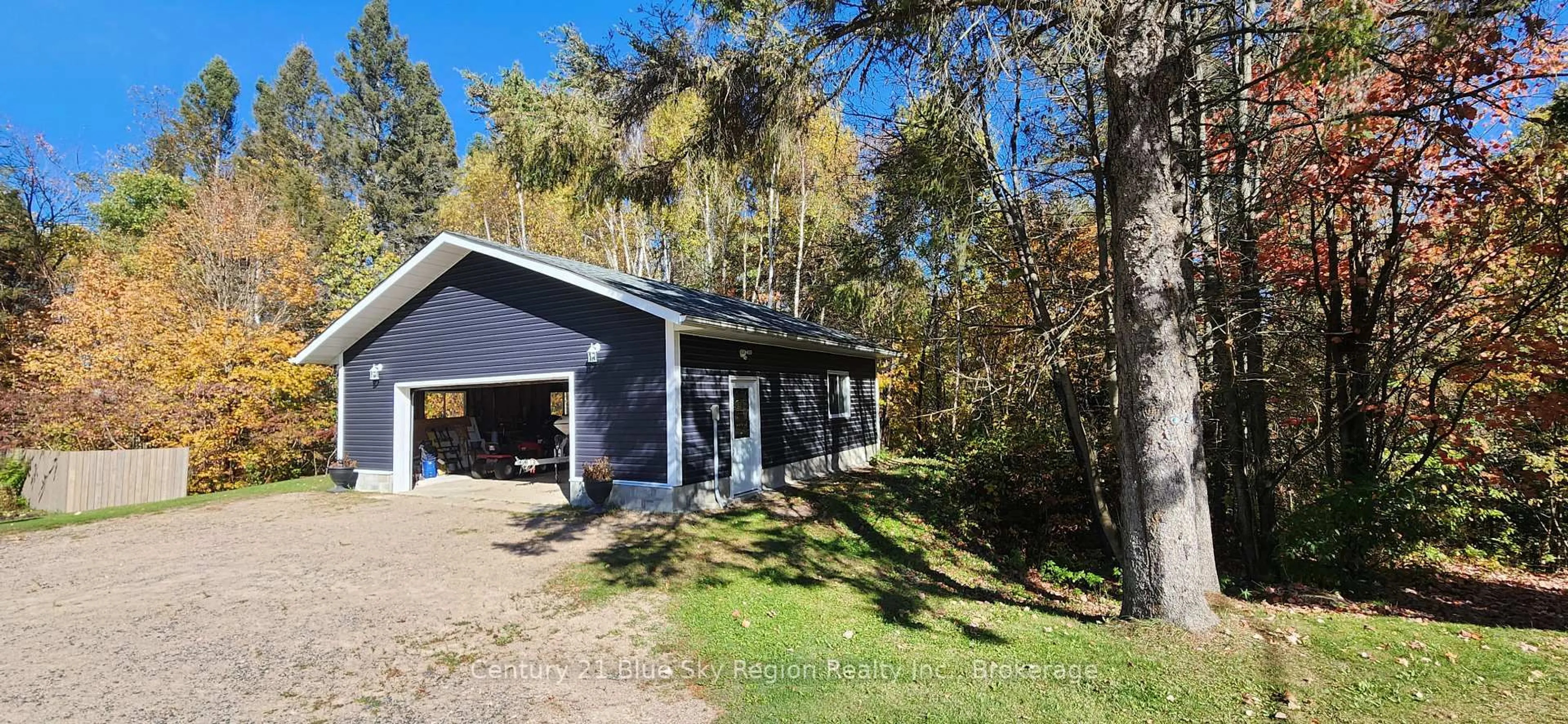 A pic from outside/outdoor area/front of a property/back of a property/a pic from drone, forest/trees view for 223 Development Rd, Bonfield Ontario P0H 1E0