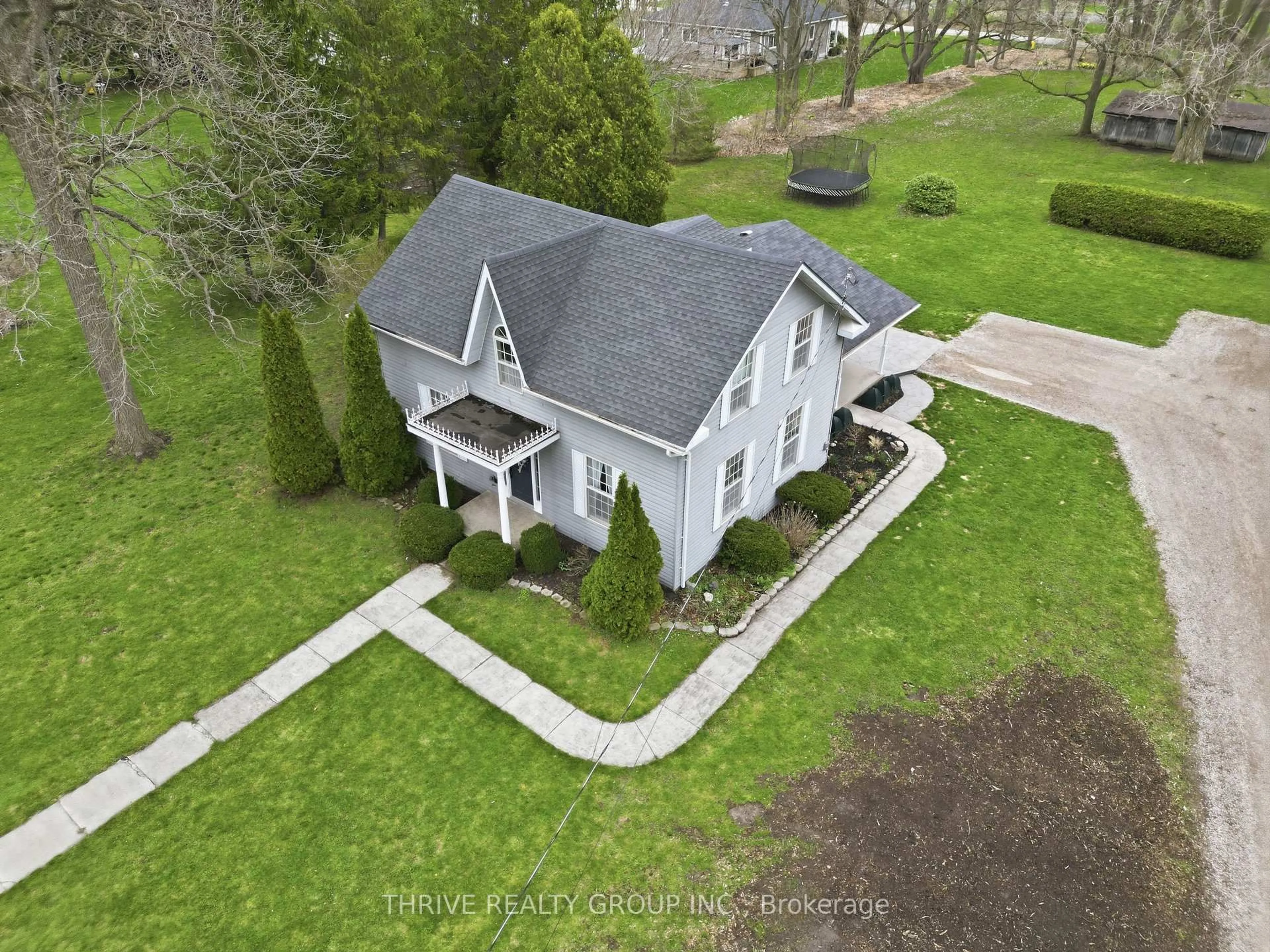 A pic from outside/outdoor area/front of a property/back of a property/a pic from drone, unknown for 160 West Park Dr, North Middlesex Ontario N0M 2K0