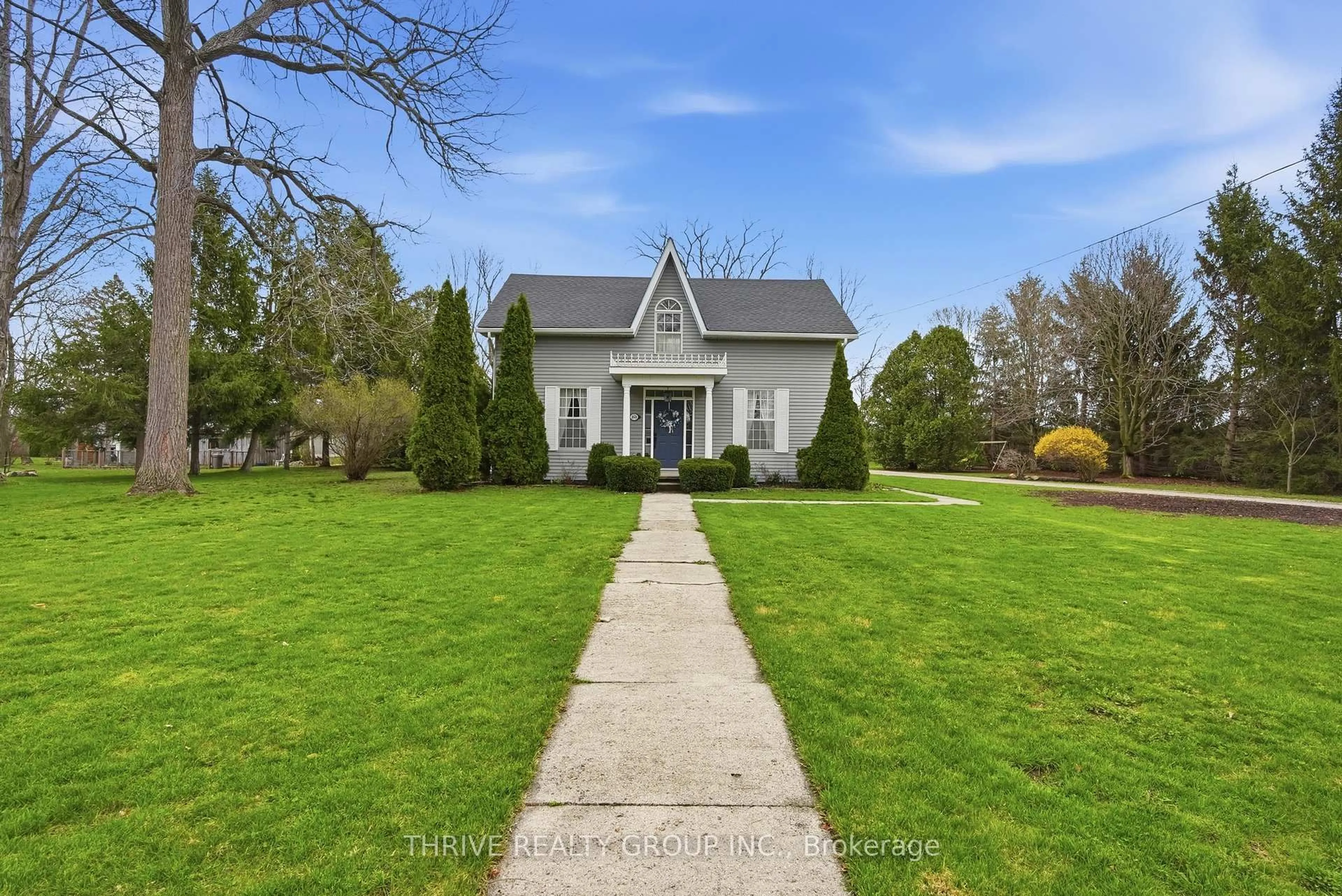 A pic from outside/outdoor area/front of a property/back of a property/a pic from drone, street for 160 West Park Dr, North Middlesex Ontario N0M 2K0