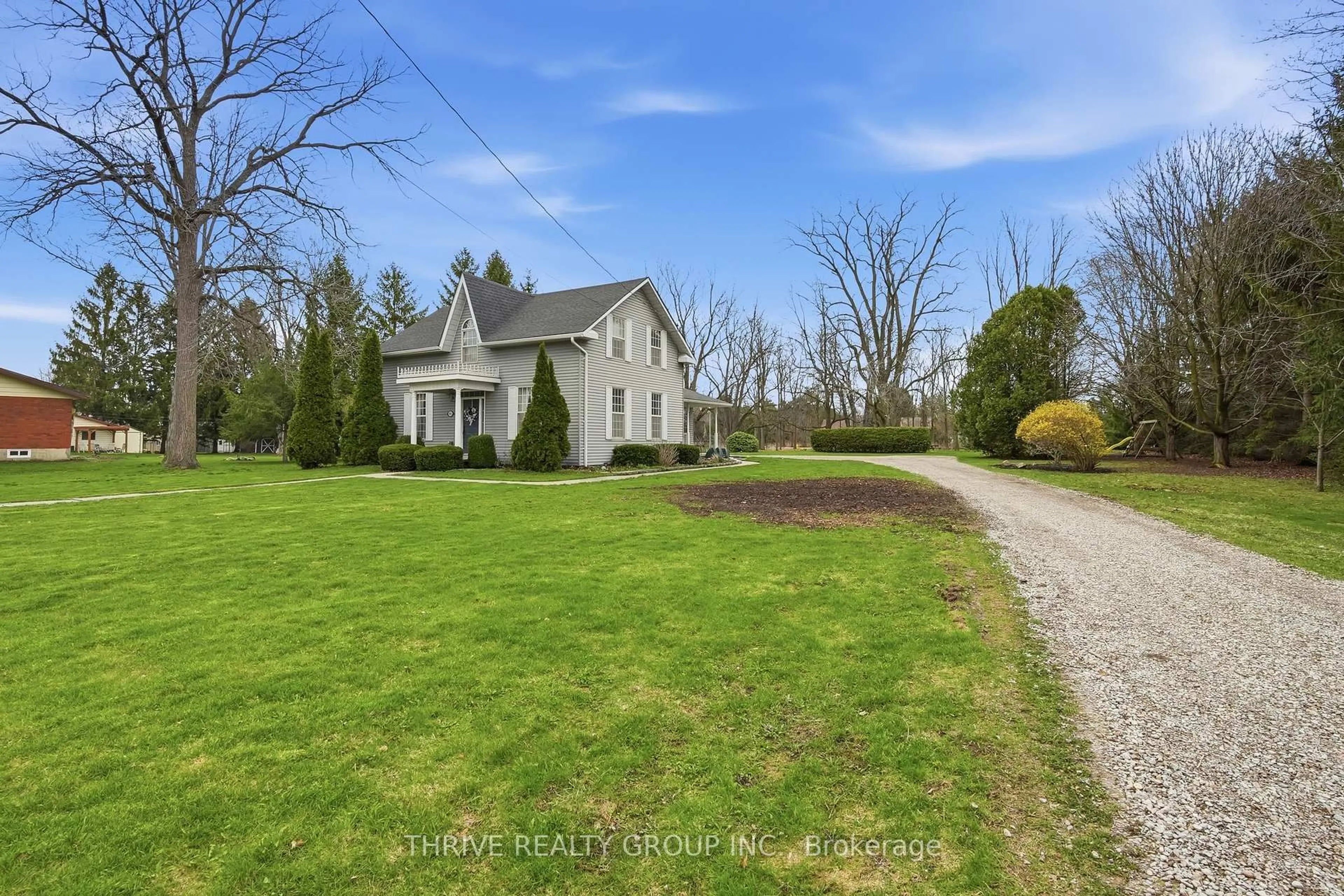 A pic from outside/outdoor area/front of a property/back of a property/a pic from drone, street for 160 West Park Dr, North Middlesex Ontario N0M 2K0