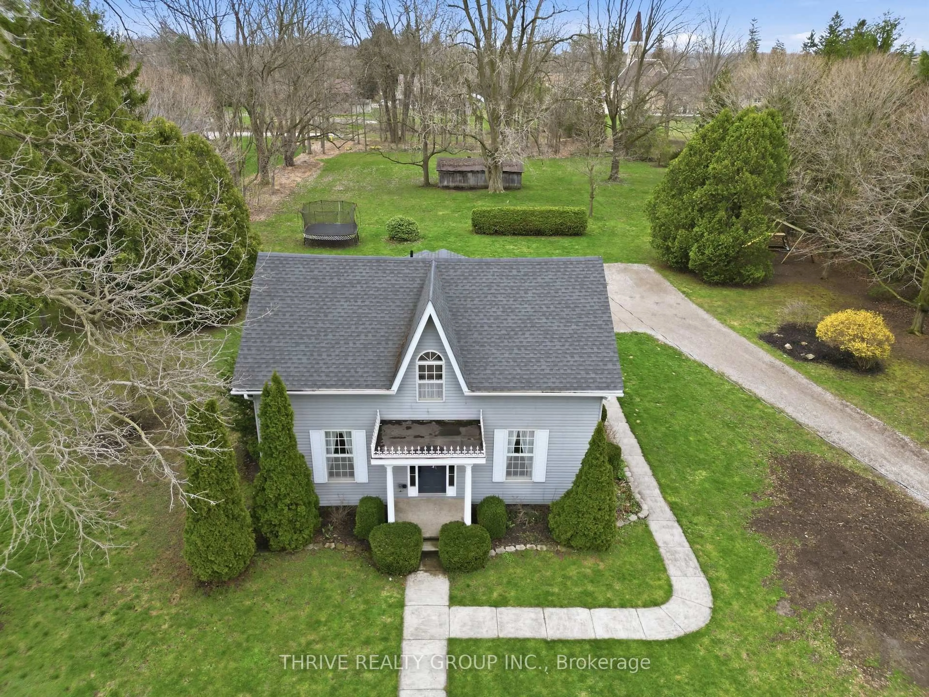 A pic from outside/outdoor area/front of a property/back of a property/a pic from drone, street for 160 West Park Dr, North Middlesex Ontario N0M 2K0