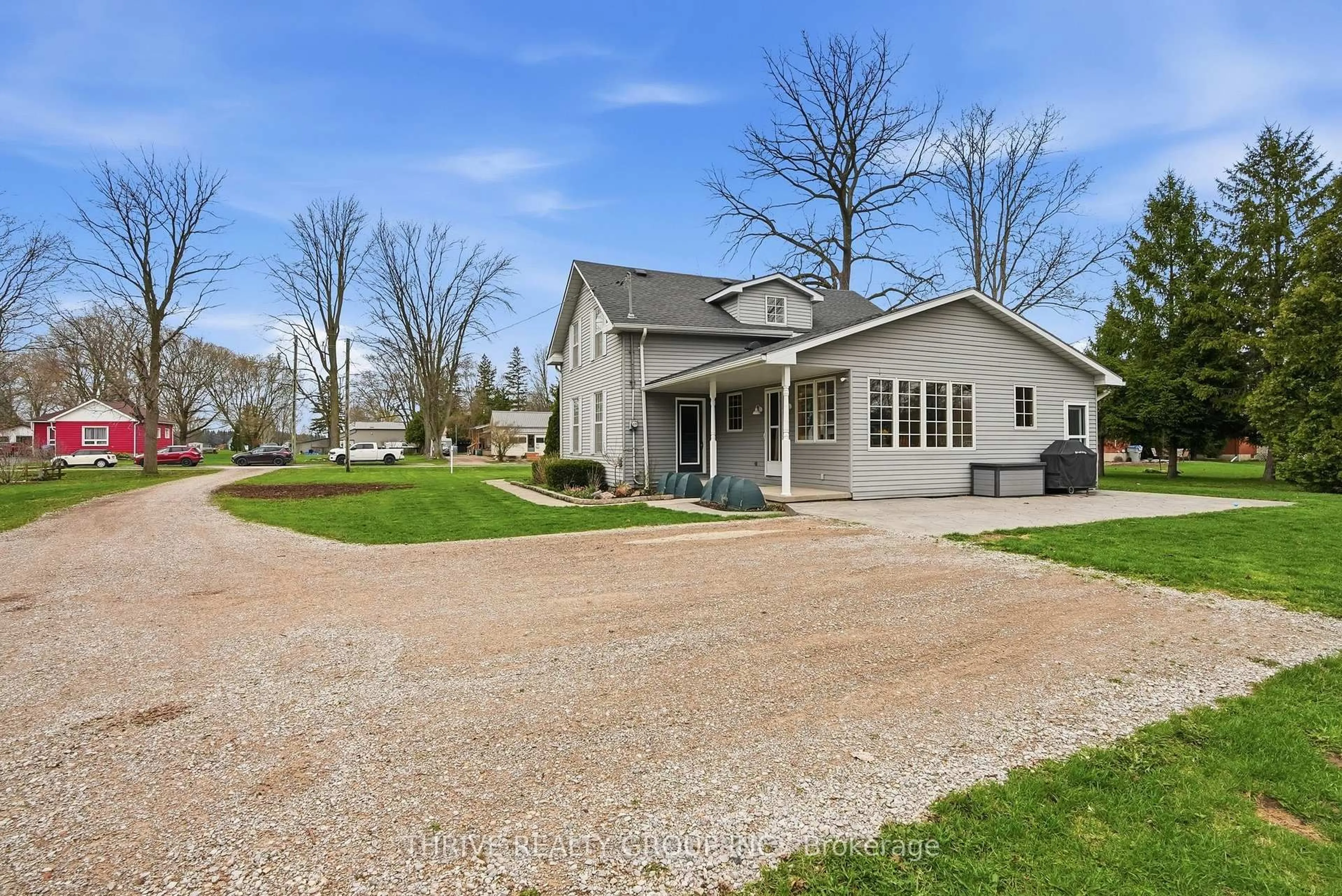 A pic from outside/outdoor area/front of a property/back of a property/a pic from drone, street for 160 West Park Dr, North Middlesex Ontario N0M 2K0