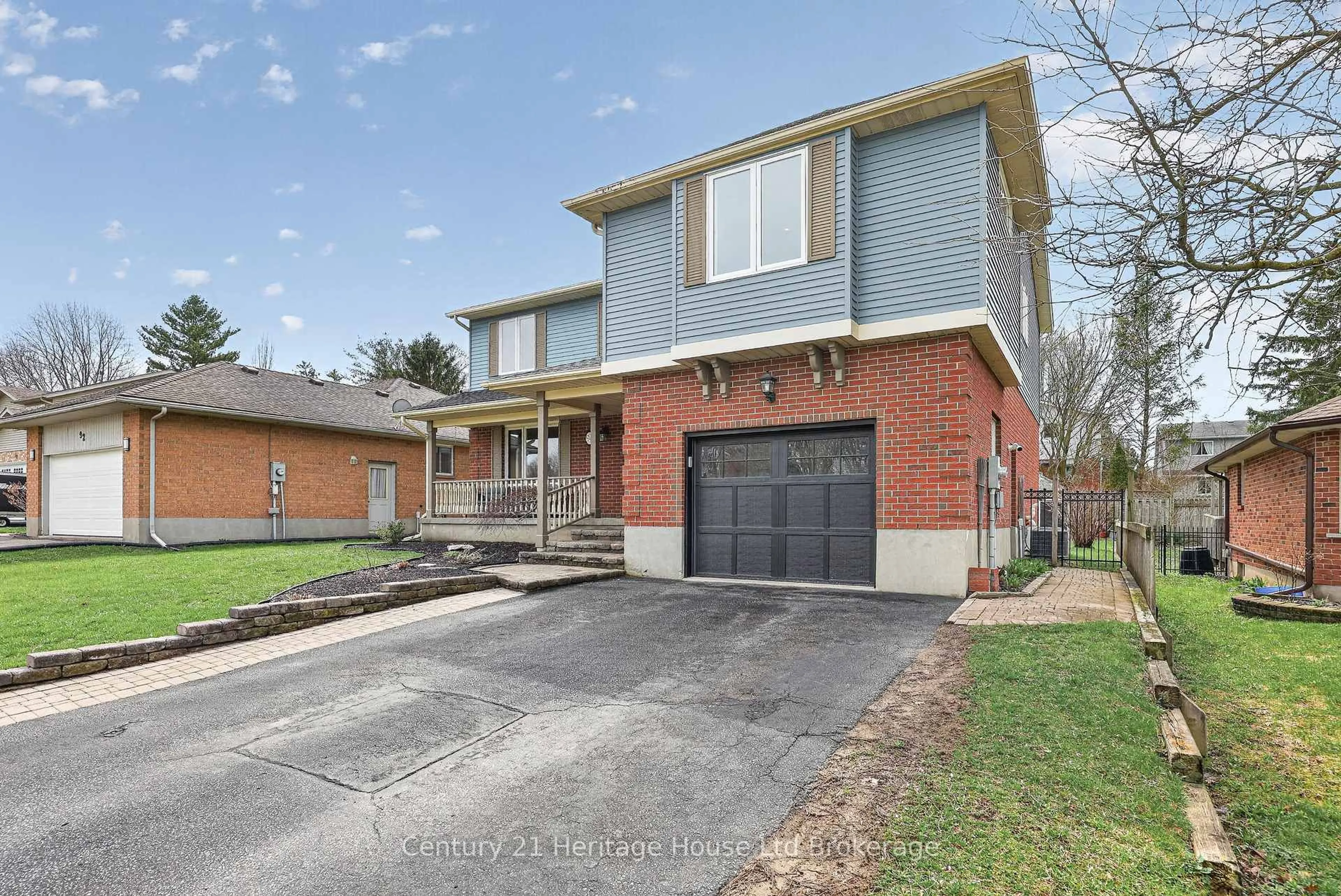 Home with brick exterior material, street for 94 Mason Dr, Ingersoll Ontario N5C 4A2