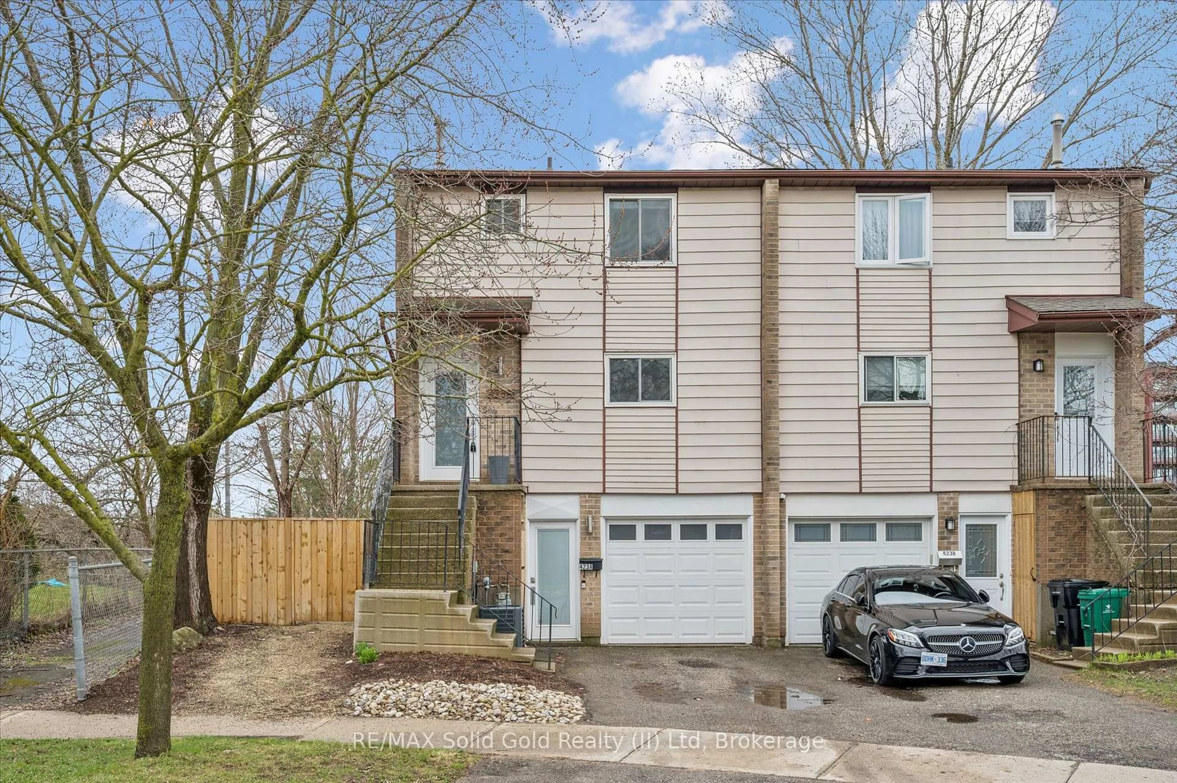 Home with vinyl exterior material, street for 423 Cadbury Crt #A, Waterloo Ontario N2K 3G7