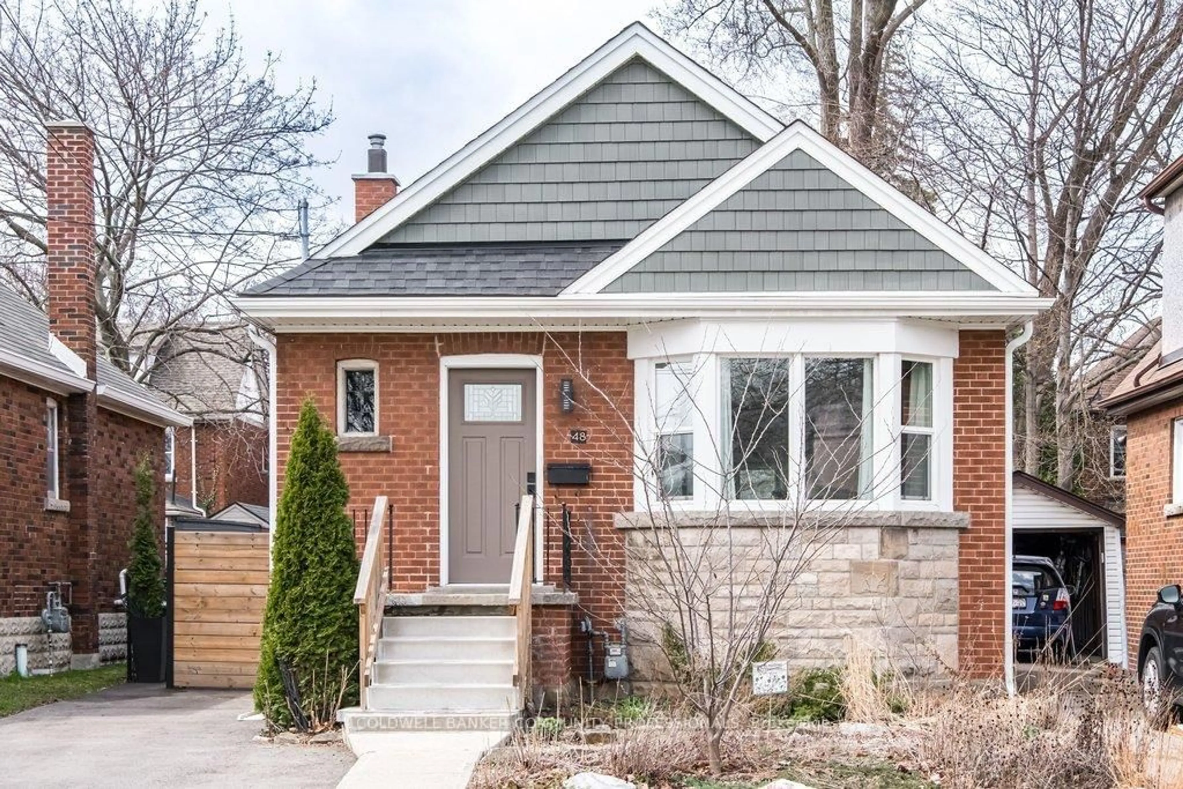 Home with brick exterior material, street for 48 Longwood Rd, Hamilton Ontario L8S 1S5