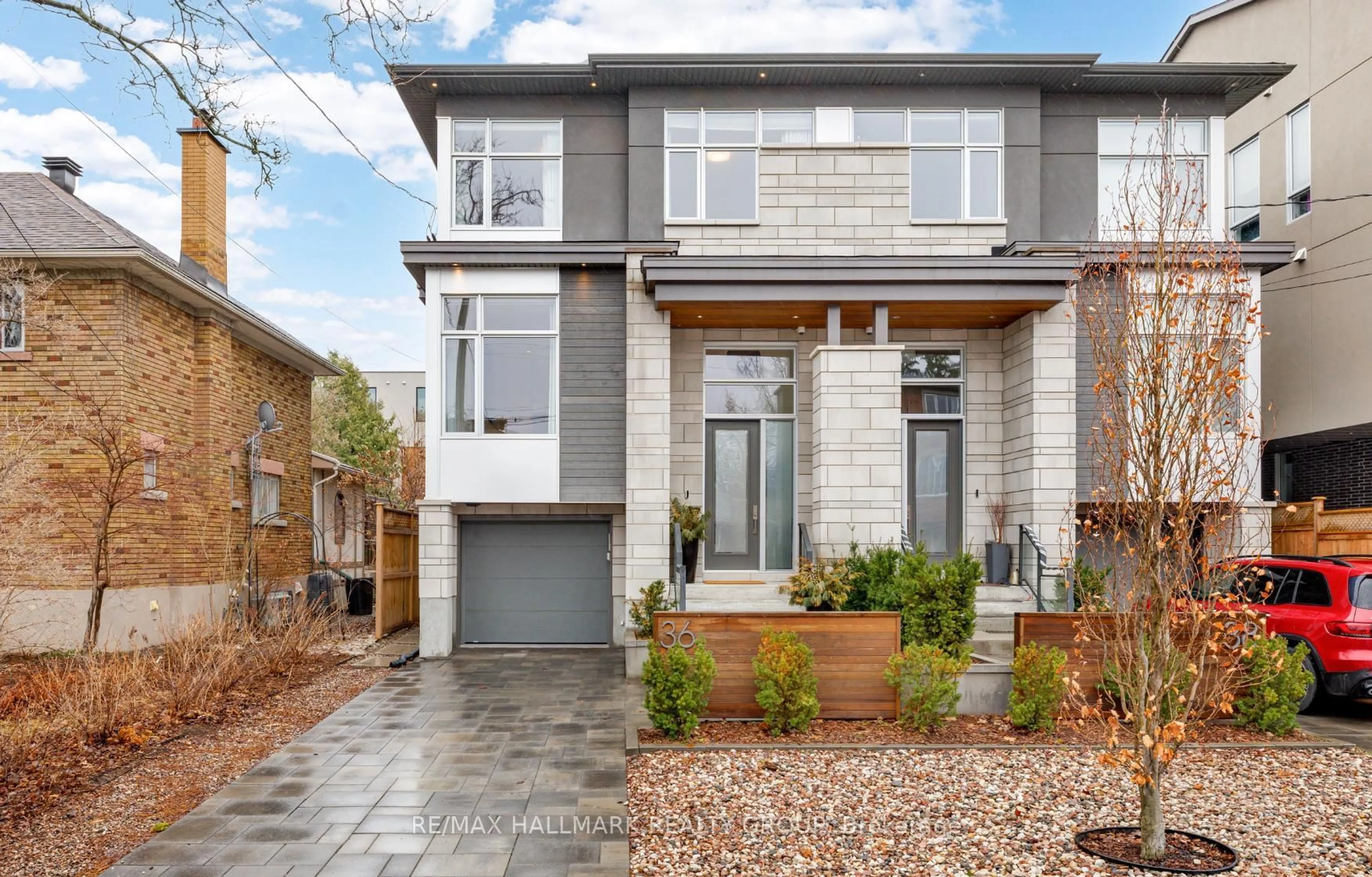 Home with brick exterior material, street for 36 Kenora St, Ottawa Ontario K1Y 3K8