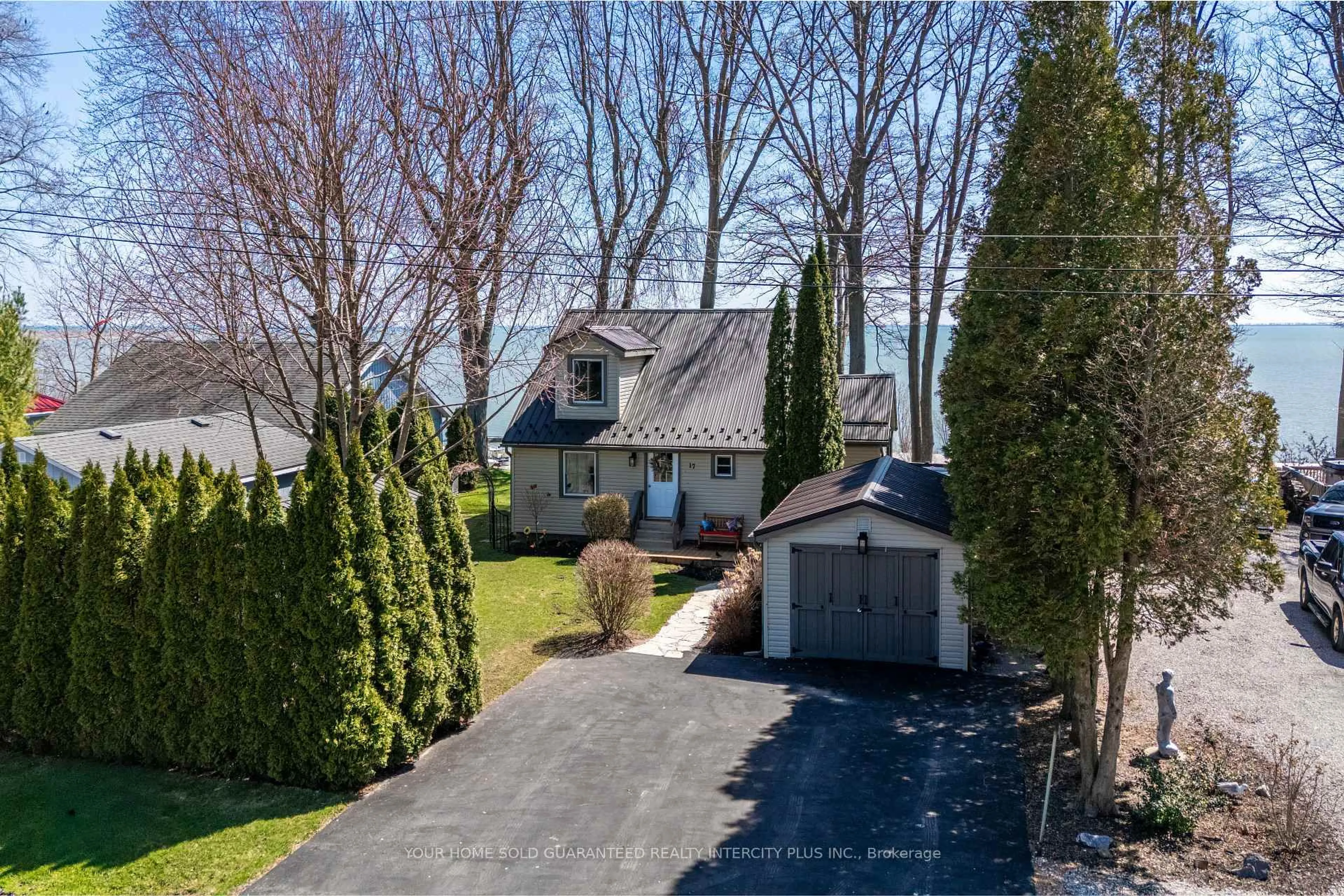 A pic from outside/outdoor area/front of a property/back of a property/a pic from drone, water/lake/river/ocean view for 17 Bee St, Norfolk Ontario N0E 1P0