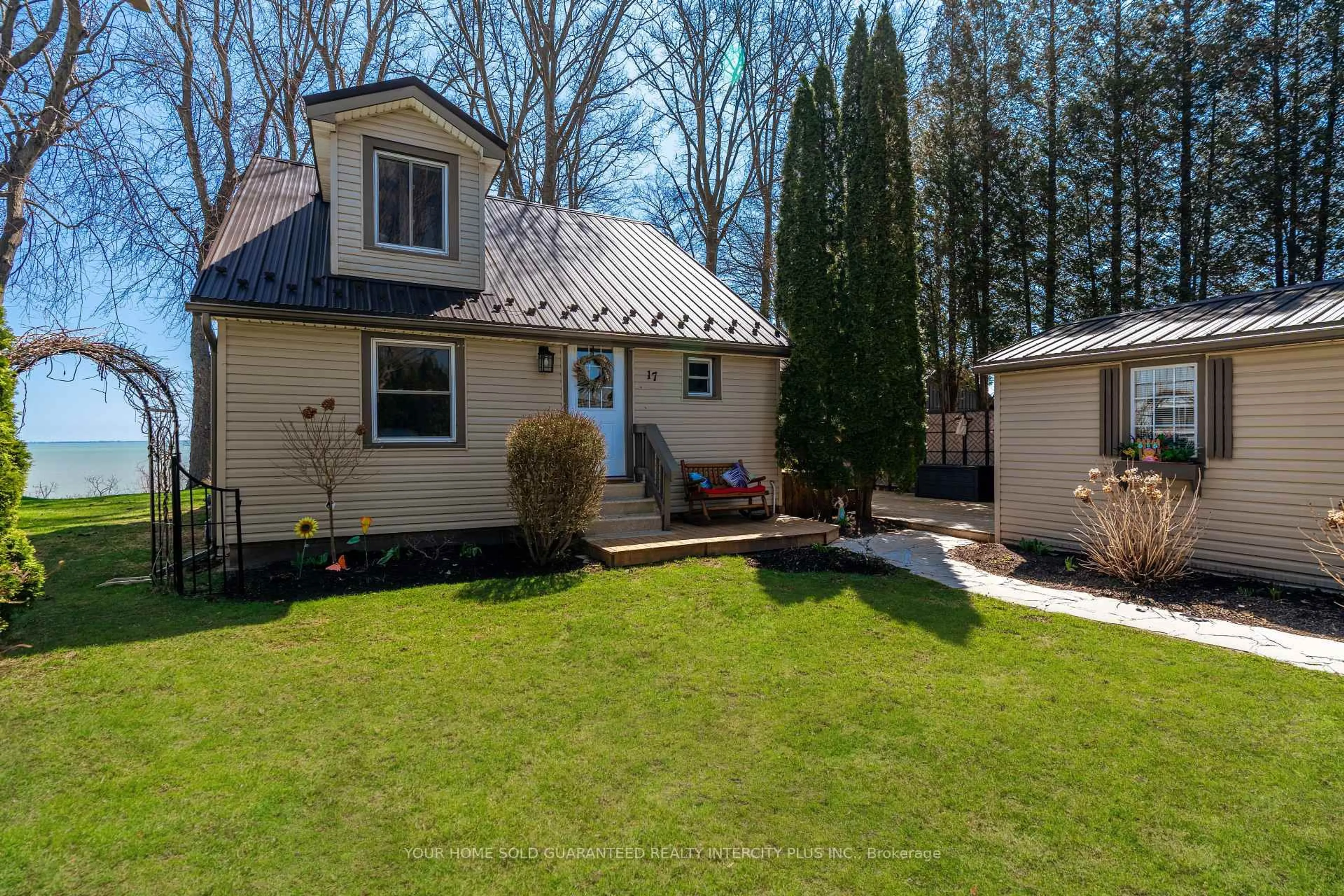 Home with vinyl exterior material, street for 17 Bee St, Norfolk Ontario N0E 1P0