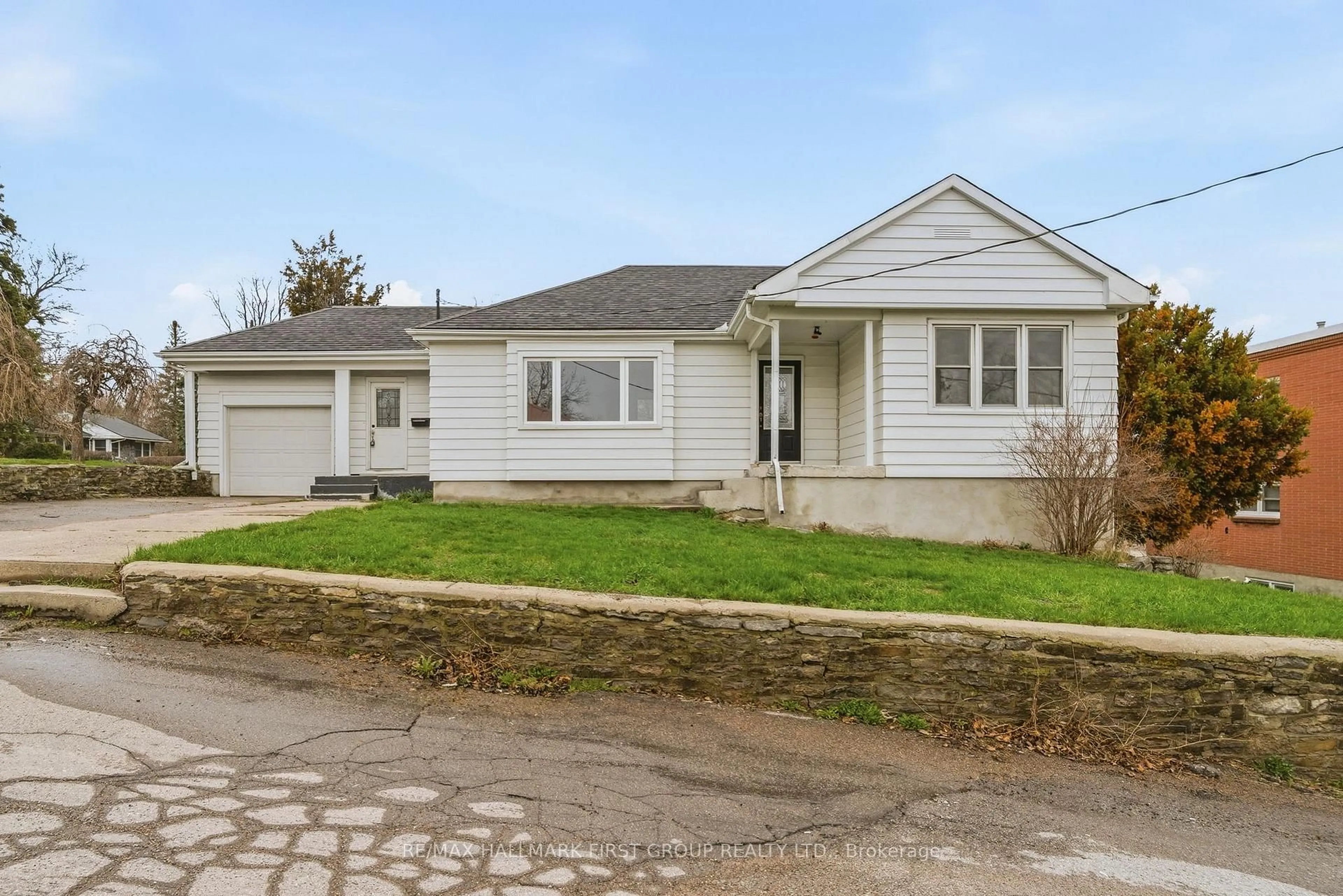 Home with vinyl exterior material, street for 16 Sutcliffe Blvd, Quinte West Ontario K8V 3M5