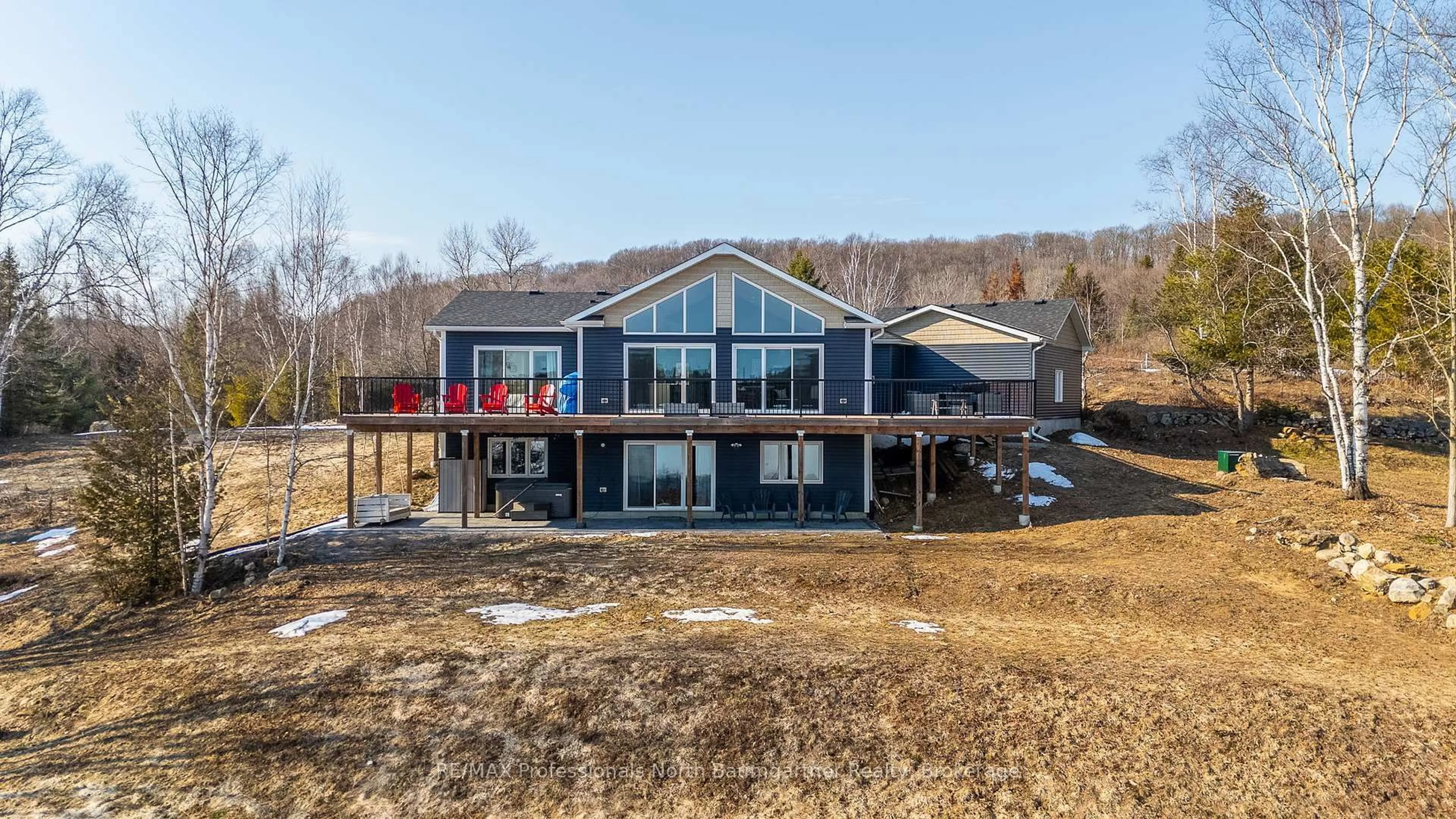 A pic from outside/outdoor area/front of a property/back of a property/a pic from drone, water/lake/river/ocean view for 4318 Glamorgan Rd, Dysart et al Ontario K0M 1S0