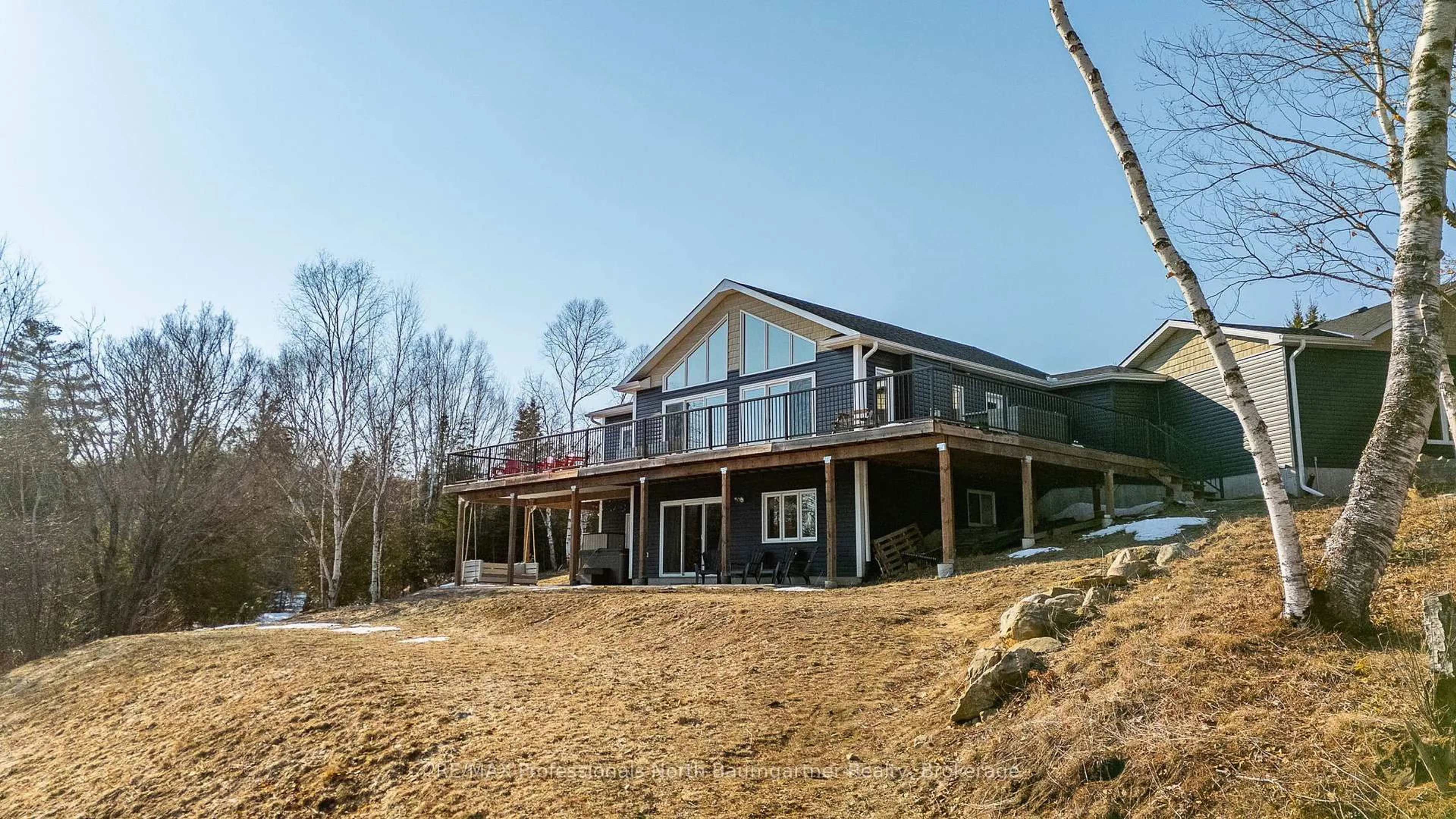 A pic from outside/outdoor area/front of a property/back of a property/a pic from drone, water/lake/river/ocean view for 4318 Glamorgan Rd, Dysart et al Ontario K0M 1S0