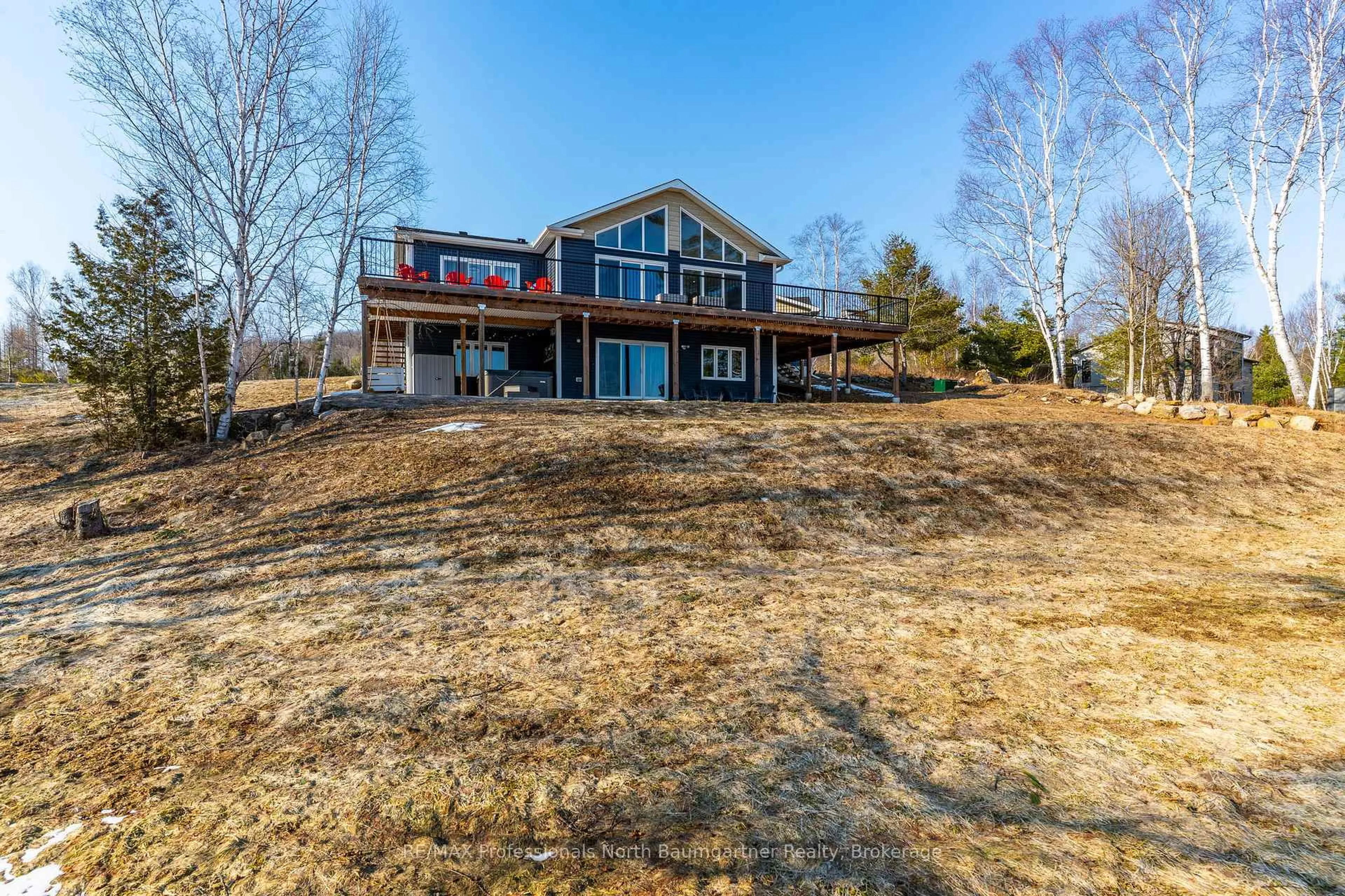 A pic from outside/outdoor area/front of a property/back of a property/a pic from drone, water/lake/river/ocean view for 4318 Glamorgan Rd, Dysart et al Ontario K0M 1S0
