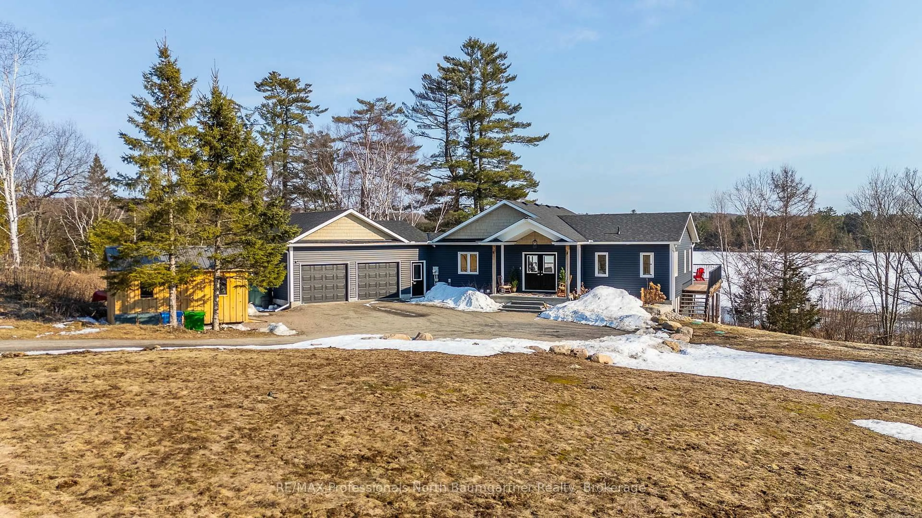 A pic from outside/outdoor area/front of a property/back of a property/a pic from drone, street for 4318 Glamorgan Rd, Dysart et al Ontario K0M 1S0