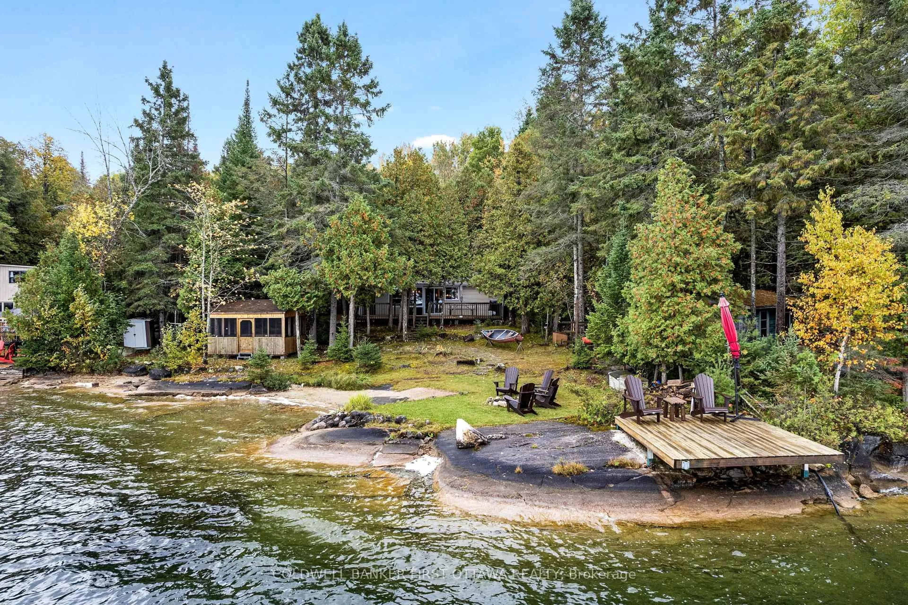A pic from outside/outdoor area/front of a property/back of a property/a pic from drone, water/lake/river/ocean view for 334 Featherston Lane, Maberly Ontario K0H 2B0