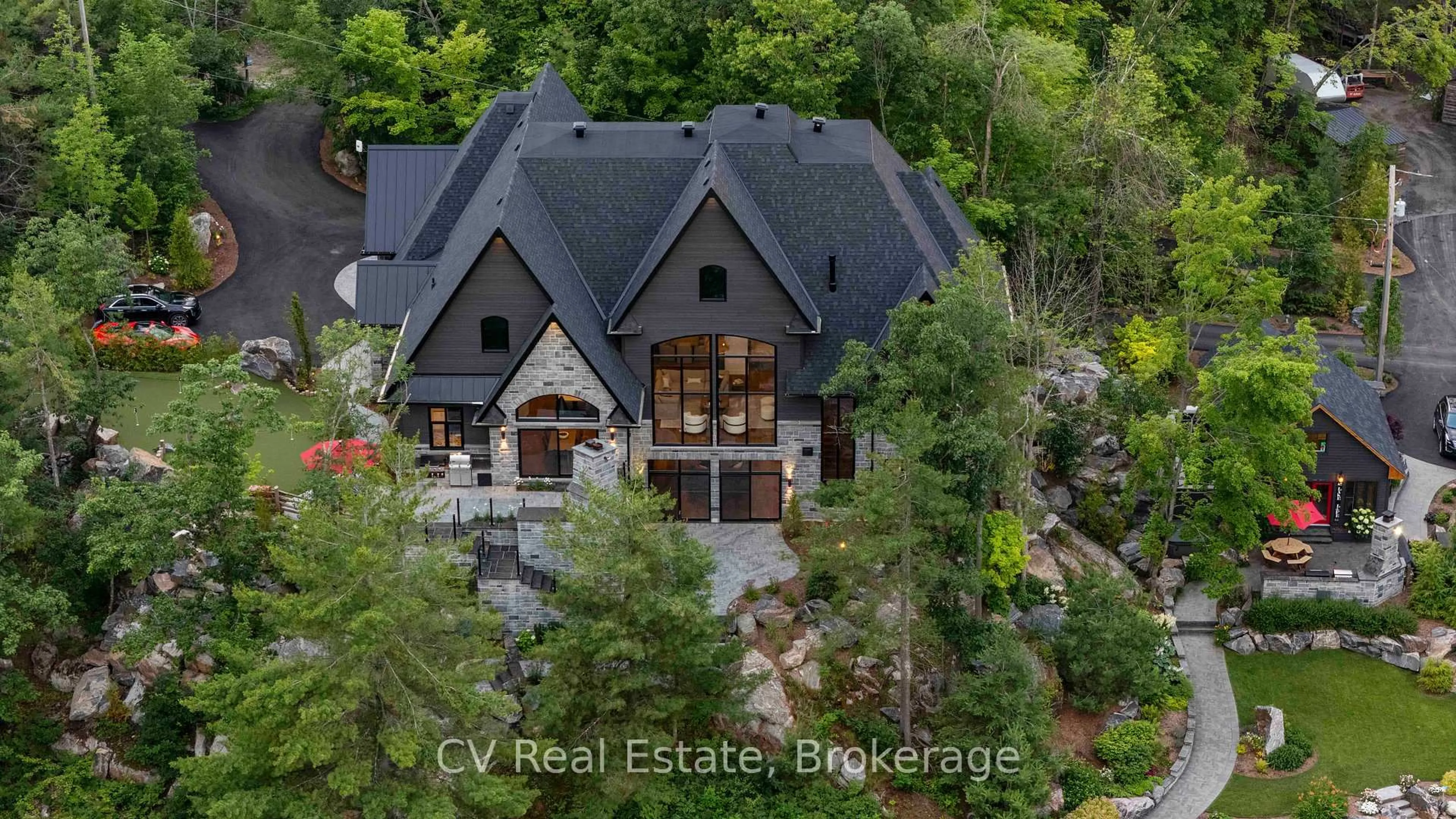 A pic from outside/outdoor area/front of a property/back of a property/a pic from drone, unknown for 1031 Road 2900, Gravenhurst Ontario P1P 1R2