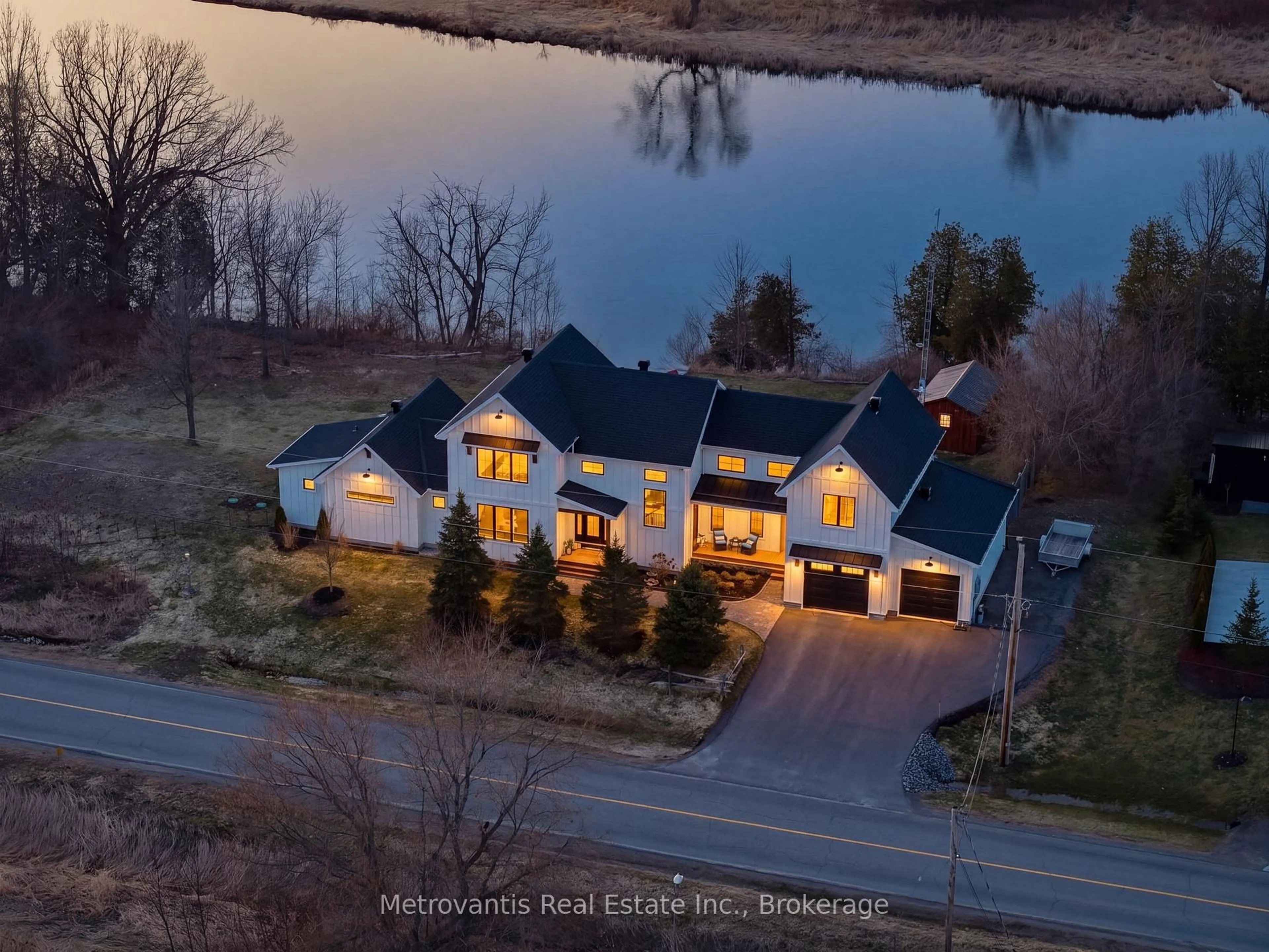 A pic from outside/outdoor area/front of a property/back of a property/a pic from drone, water/lake/river/ocean view for 699 River Rd, North Grenville Ontario K0G 1J0