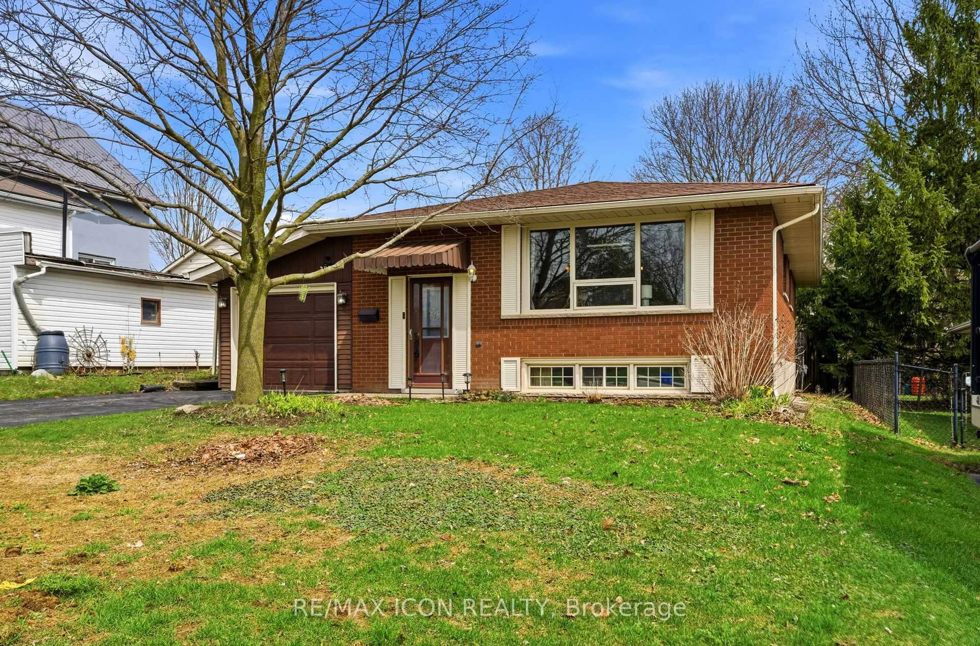 Home with brick exterior material, street for 13 Greenwood Dr, Wilmot Ontario N3A 1L1