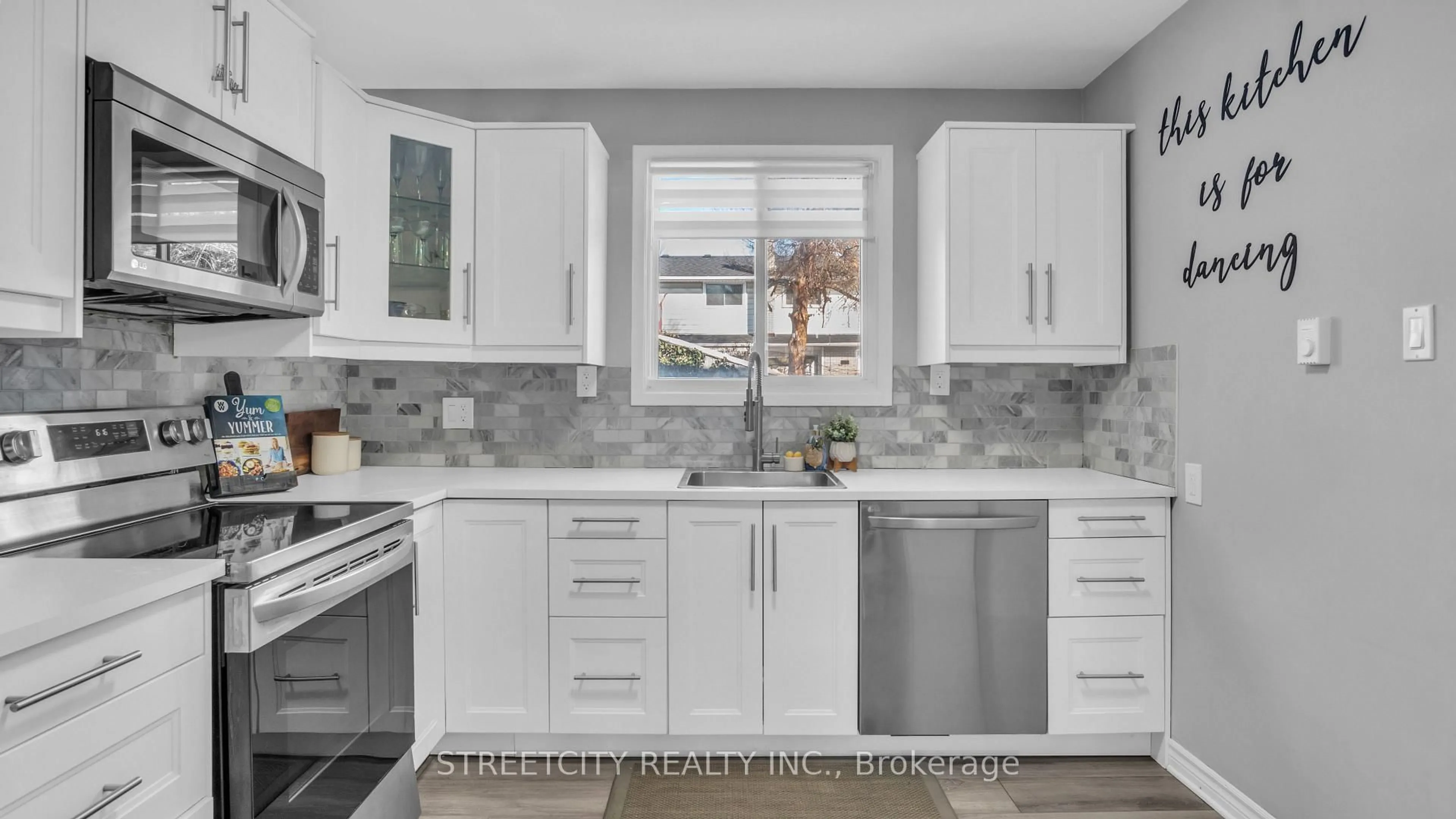 Open concept kitchen, ceramic/tile floor for 490 SOUTHDALE Rd #8, London South Ontario N6E 1A4