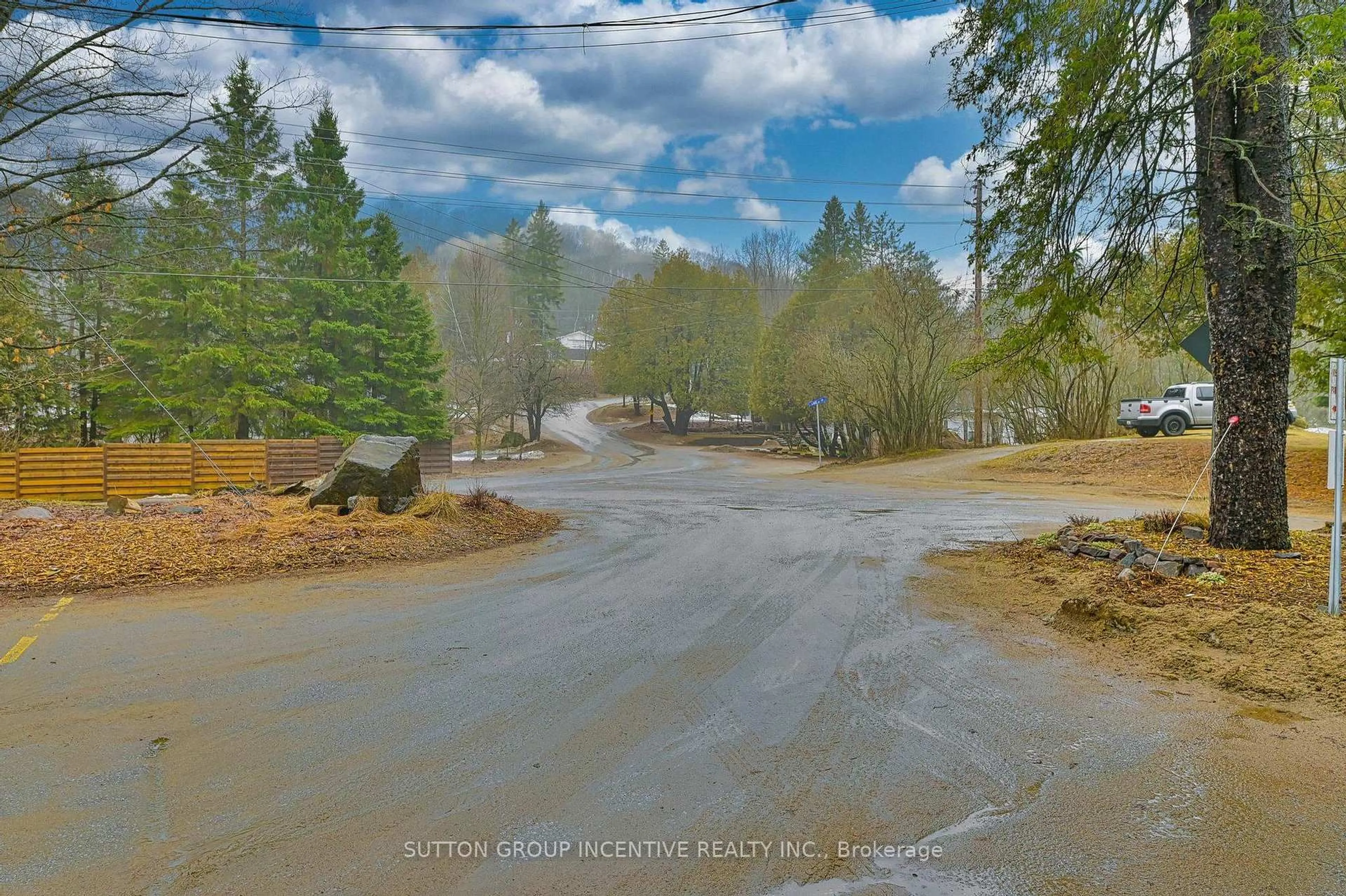 A pic from outside/outdoor area/front of a property/back of a property/a pic from drone, water/lake/river/ocean view for 4 Lake Ave #307, Dysart et al Ontario K0M 1S0