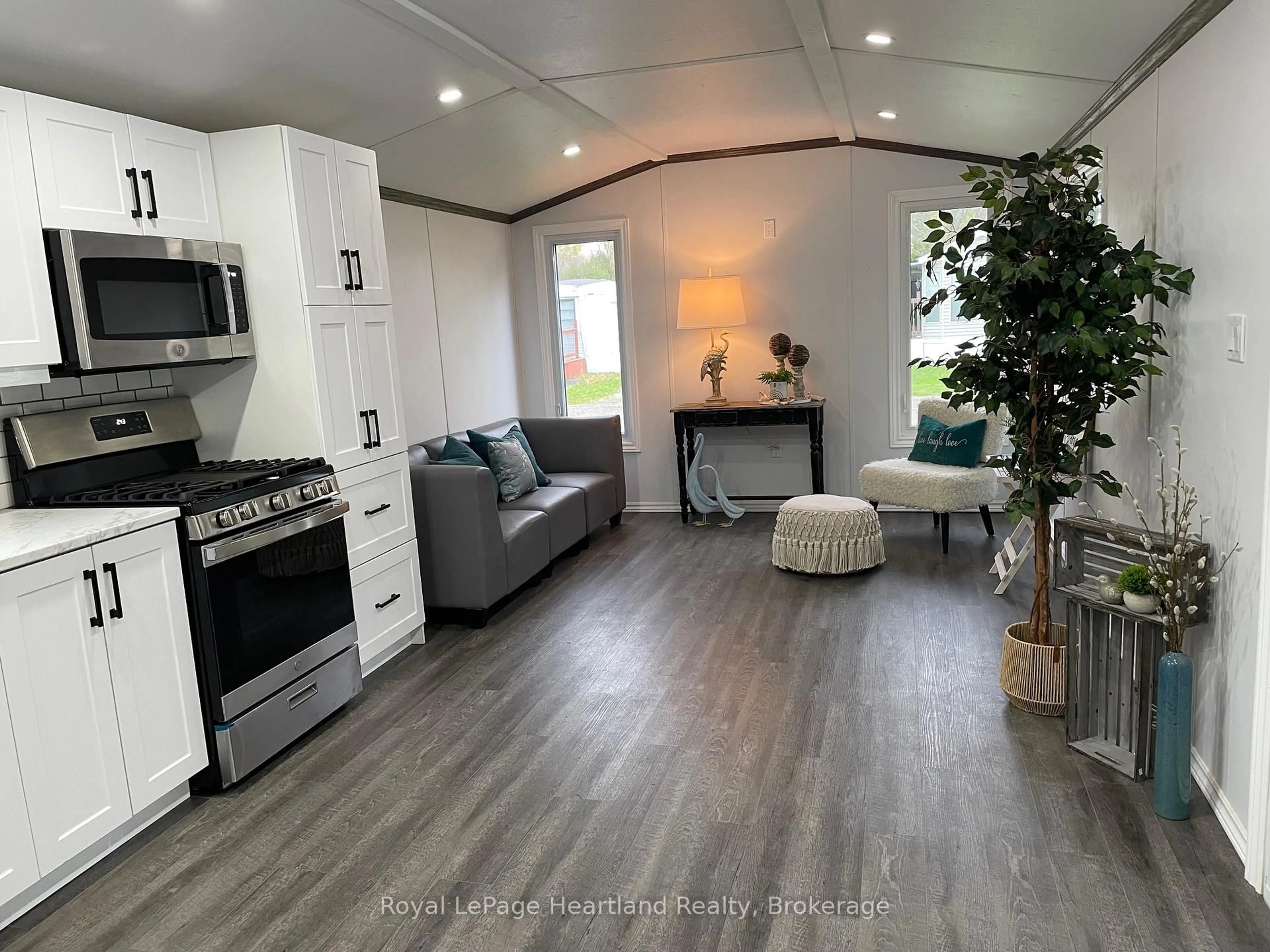 Open concept kitchen, wood/laminate floor for 77719 Bluewater Highway #4 Starboard, Central Huron Ontario N0M 1G0