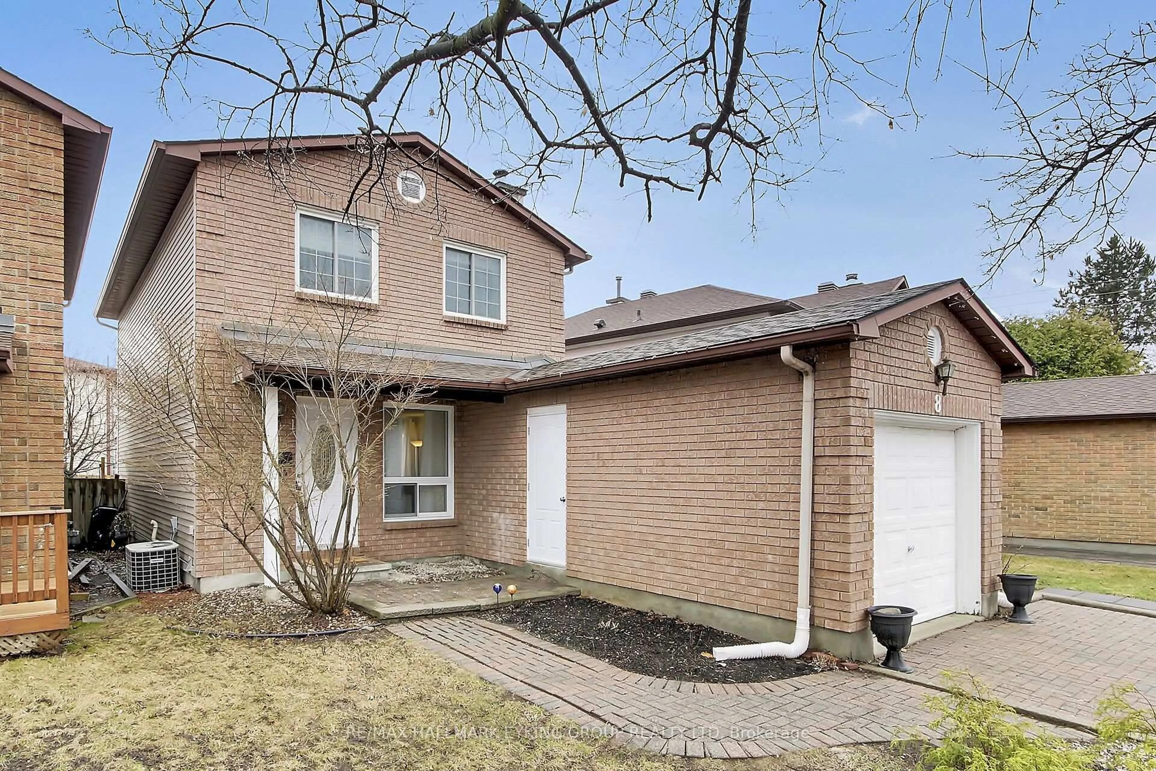 Home with brick exterior material, street for 8 Vickers Way, Ottawa Ontario K2L 3P9