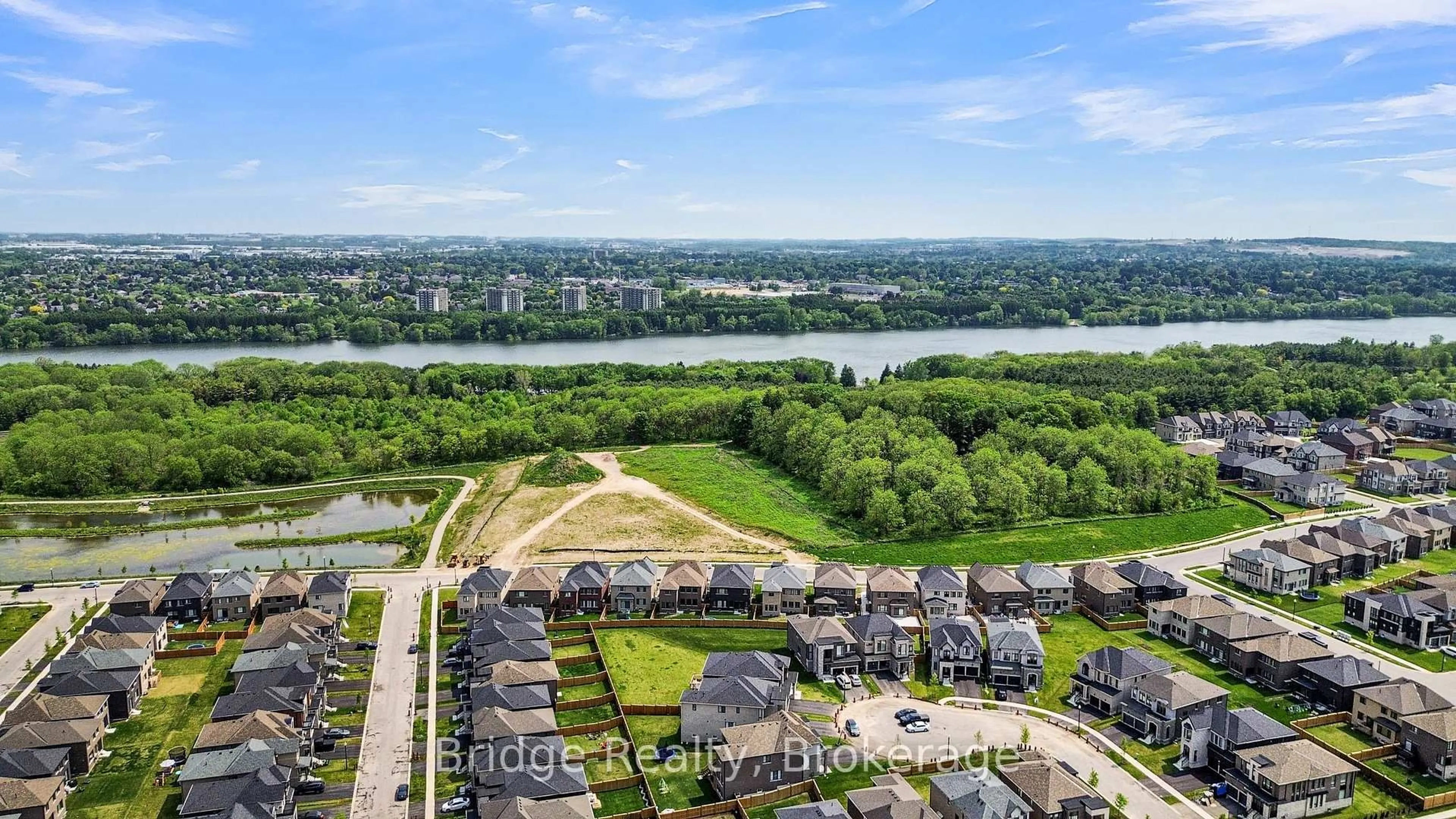A pic from outside/outdoor area/front of a property/back of a property/a pic from drone, water/lake/river/ocean view for 1343 Upper Thames Dr, Woodstock Ontario N4T 0N1