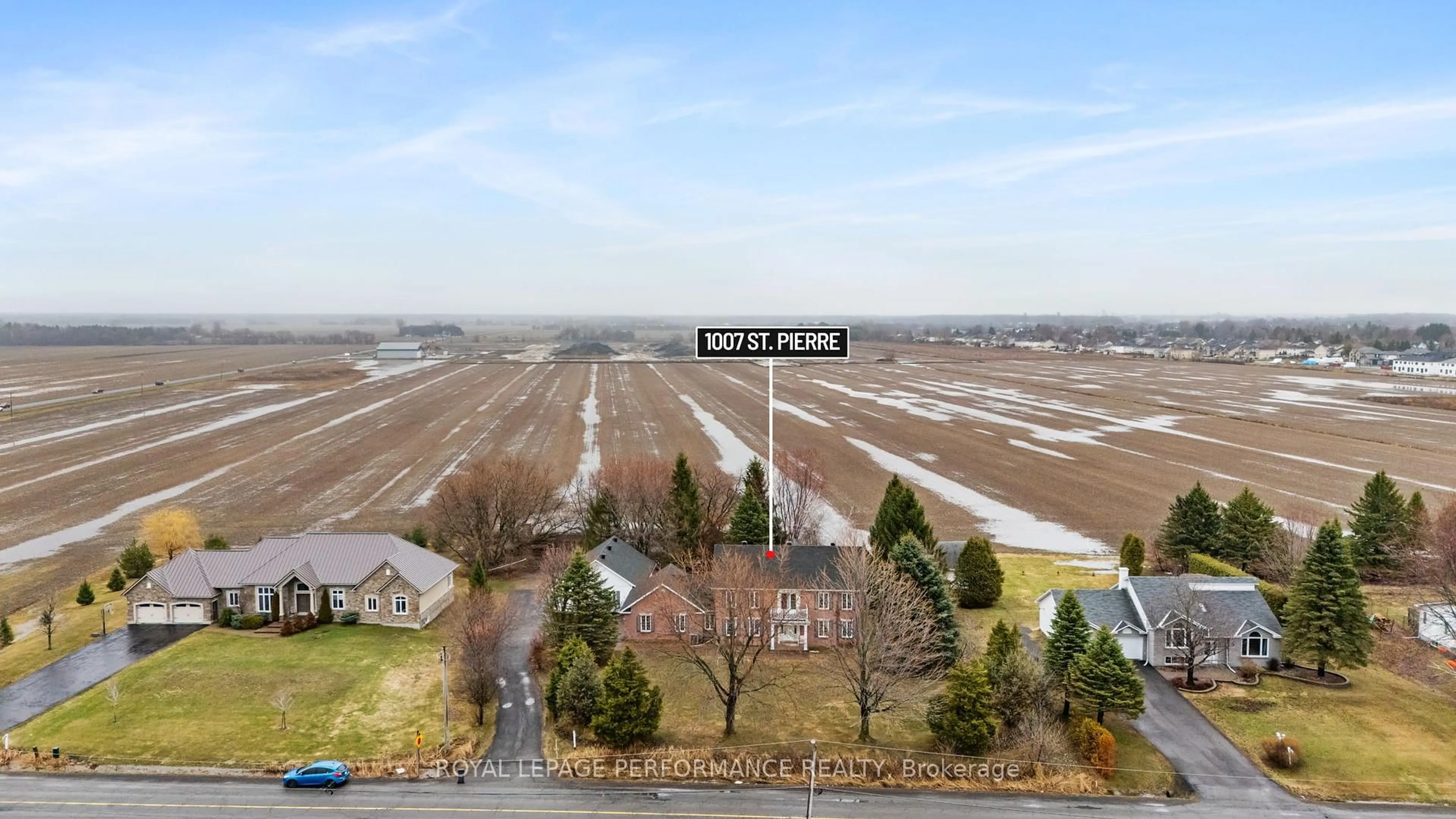 A pic from outside/outdoor area/front of a property/back of a property/a pic from drone, unknown for 1007 St Pierre Rd, Russell Ontario K0A 1W0