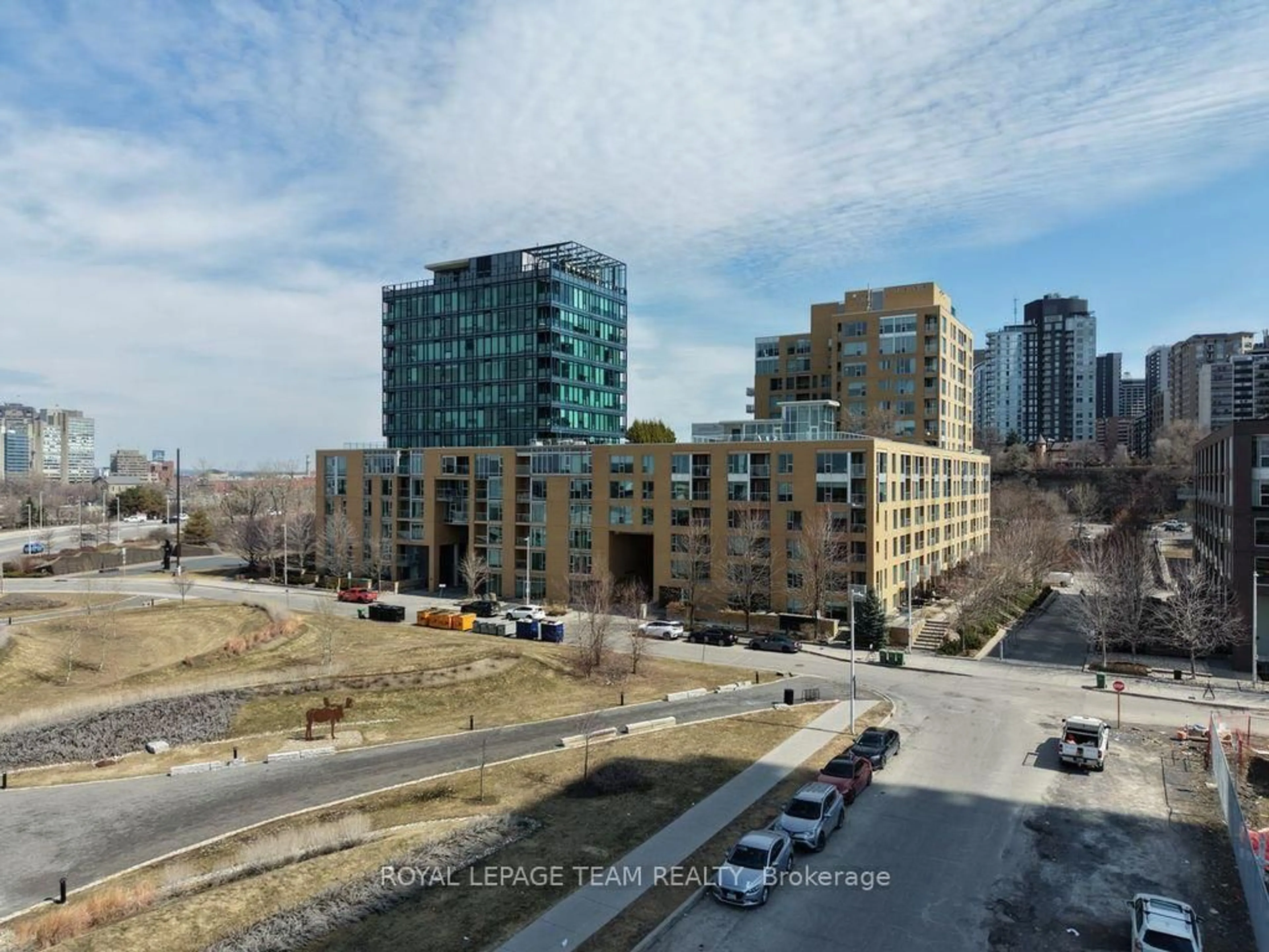A pic from outside/outdoor area/front of a property/back of a property/a pic from drone, city buildings view from balcony for 250 Lett St #406, Ottawa Ontario K1R 0A8