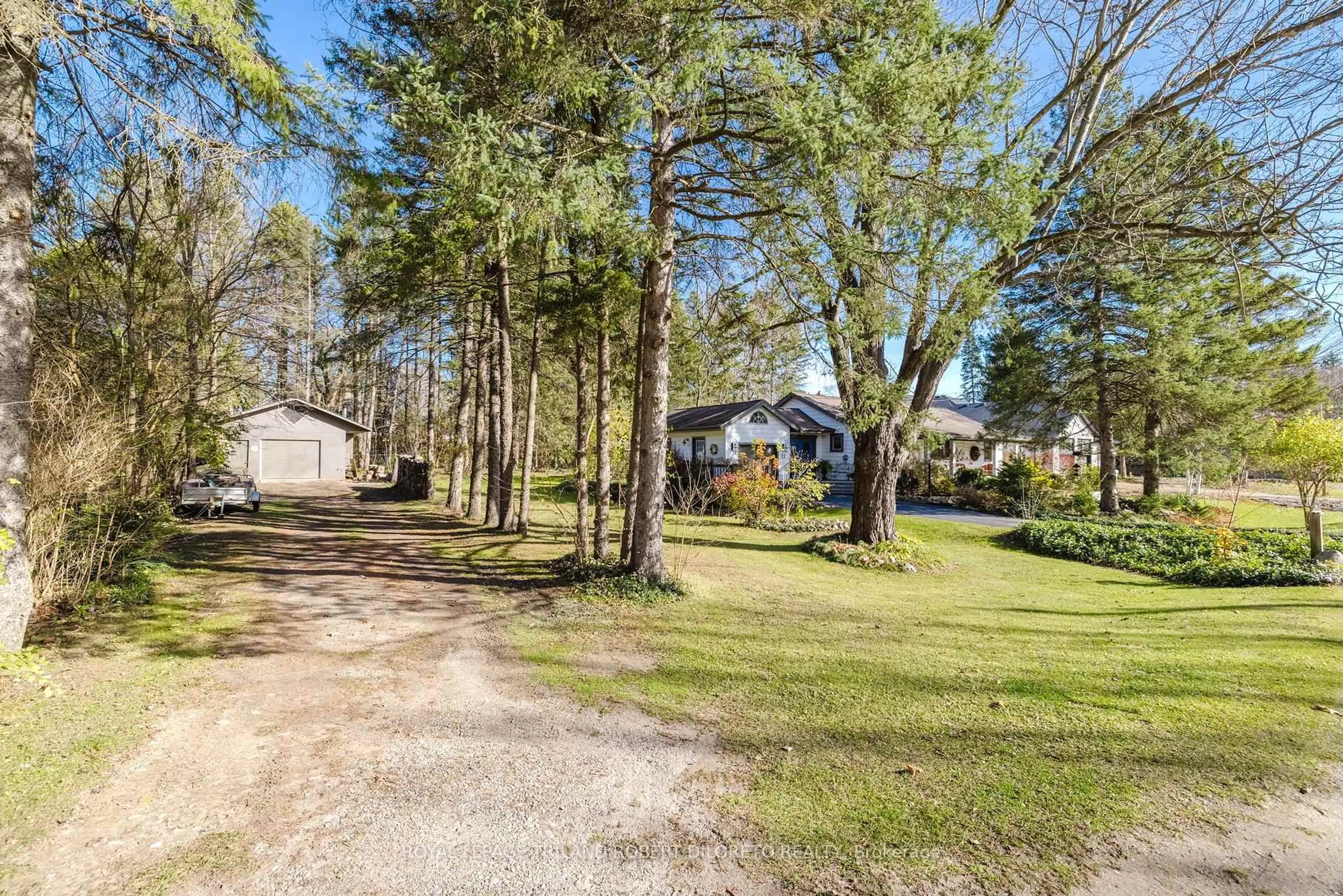 A pic from outside/outdoor area/front of a property/back of a property/a pic from drone, forest/trees view for 11 ELMHURST St, Middlesex Centre Ontario N0L 1R0