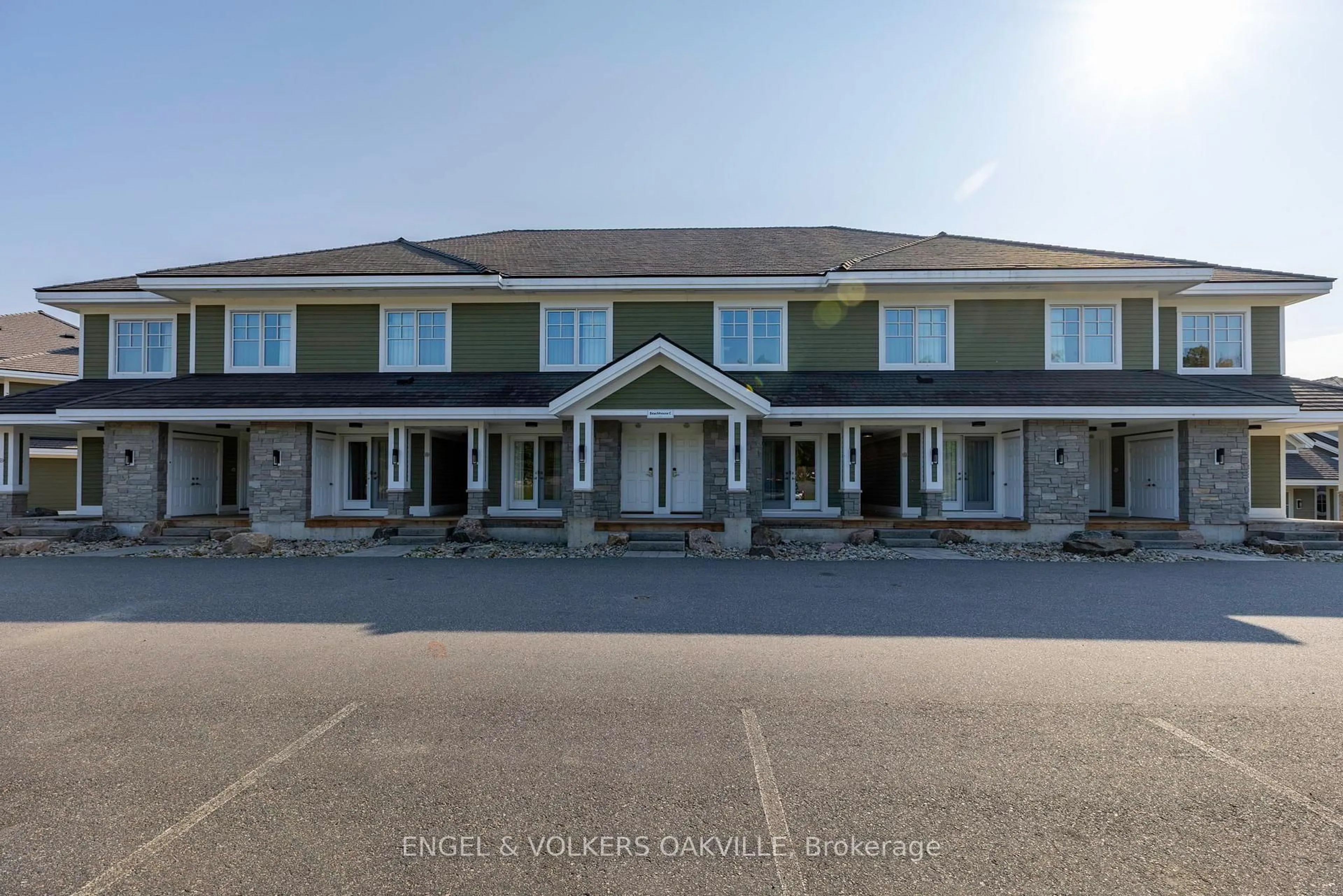 A pic from outside/outdoor area/front of a property/back of a property/a pic from drone, building for 1869 Muskoka Road 118 #C-103, Muskoka Lakes Ontario P1L 1X1