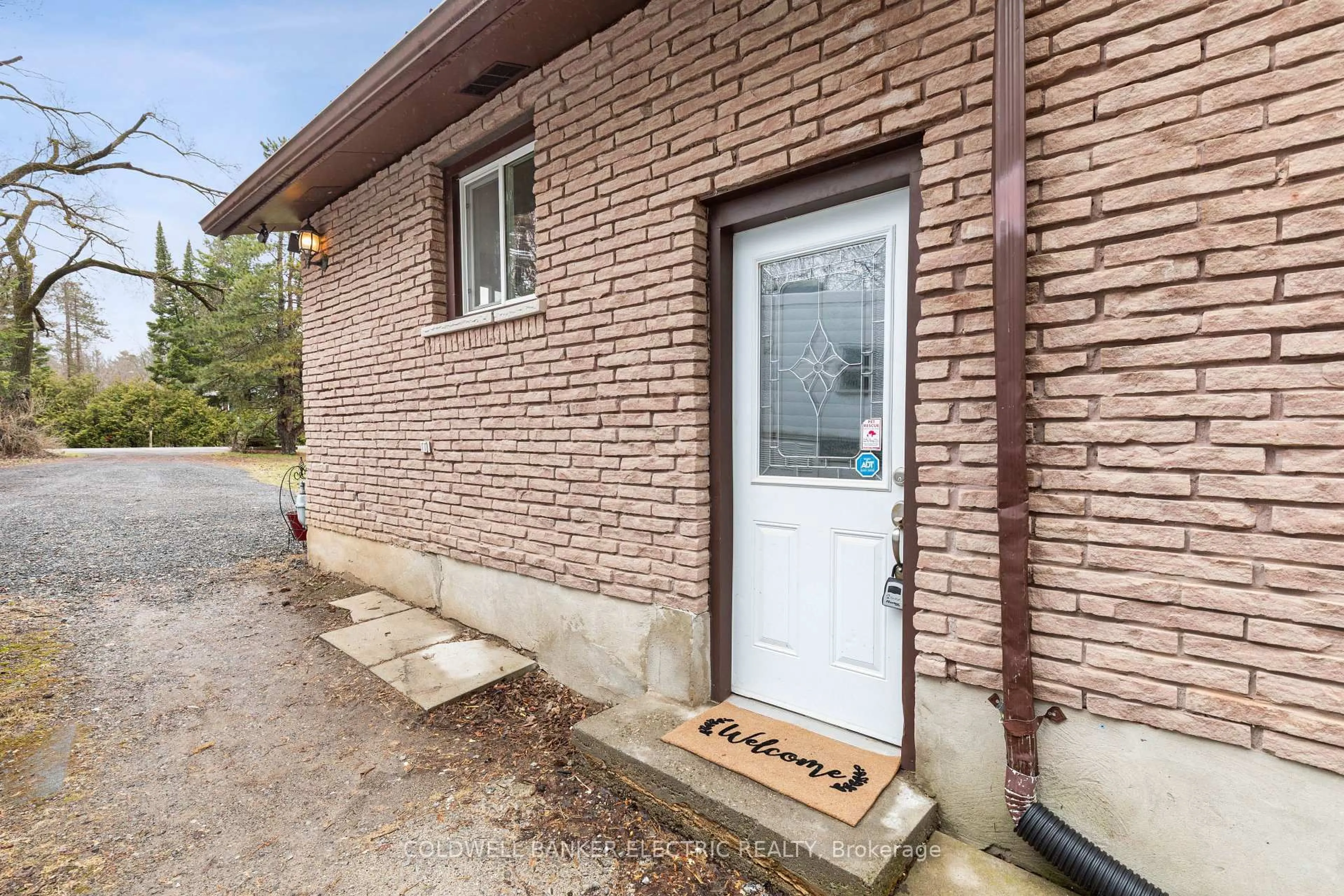 Home with brick exterior material, street for 30 Woods Ave, Kawartha Lakes Ontario K0L 2W0