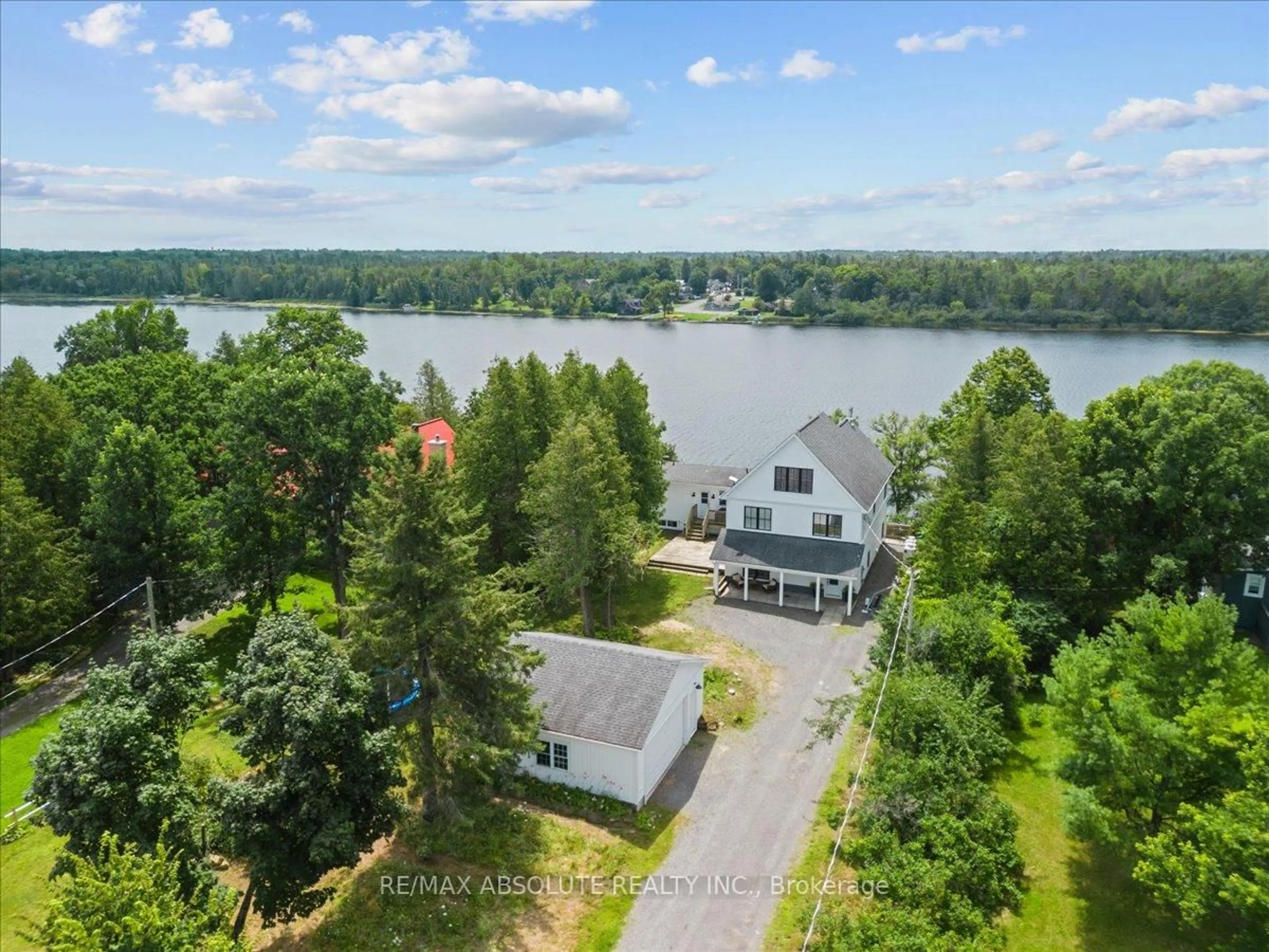 A pic from outside/outdoor area/front of a property/back of a property/a pic from drone, water/lake/river/ocean view for 5-871 BERRY SIDE Rd, Ottawa Ontario K0A 1T0