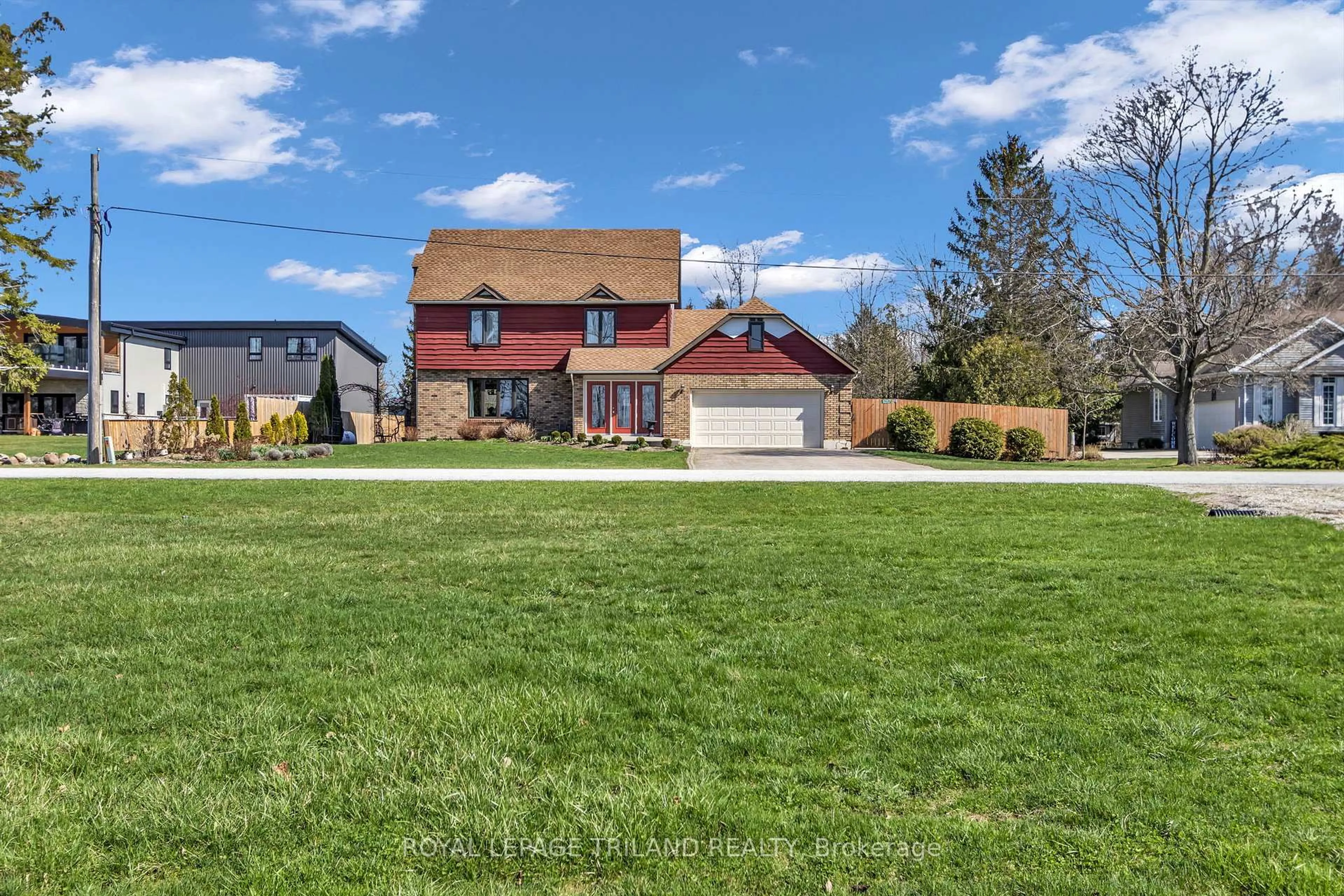 A pic from outside/outdoor area/front of a property/back of a property/a pic from drone, street for 5257 Cliff Rd, Lambton Shores Ontario N0N 1J7