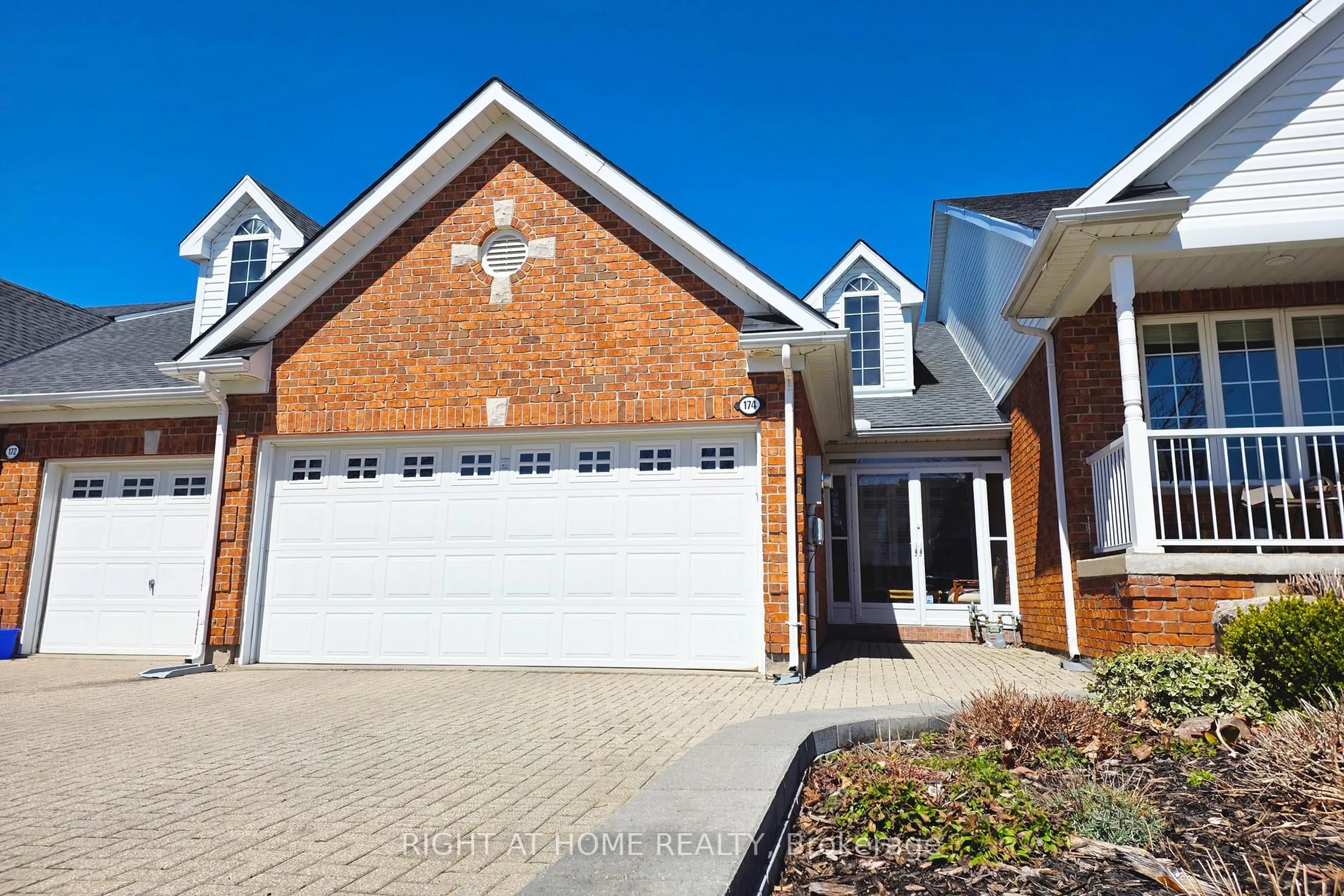 Home with brick exterior material, street for 174 Riverwalk Pl, Guelph/Eramosa Ontario N0B 2K0