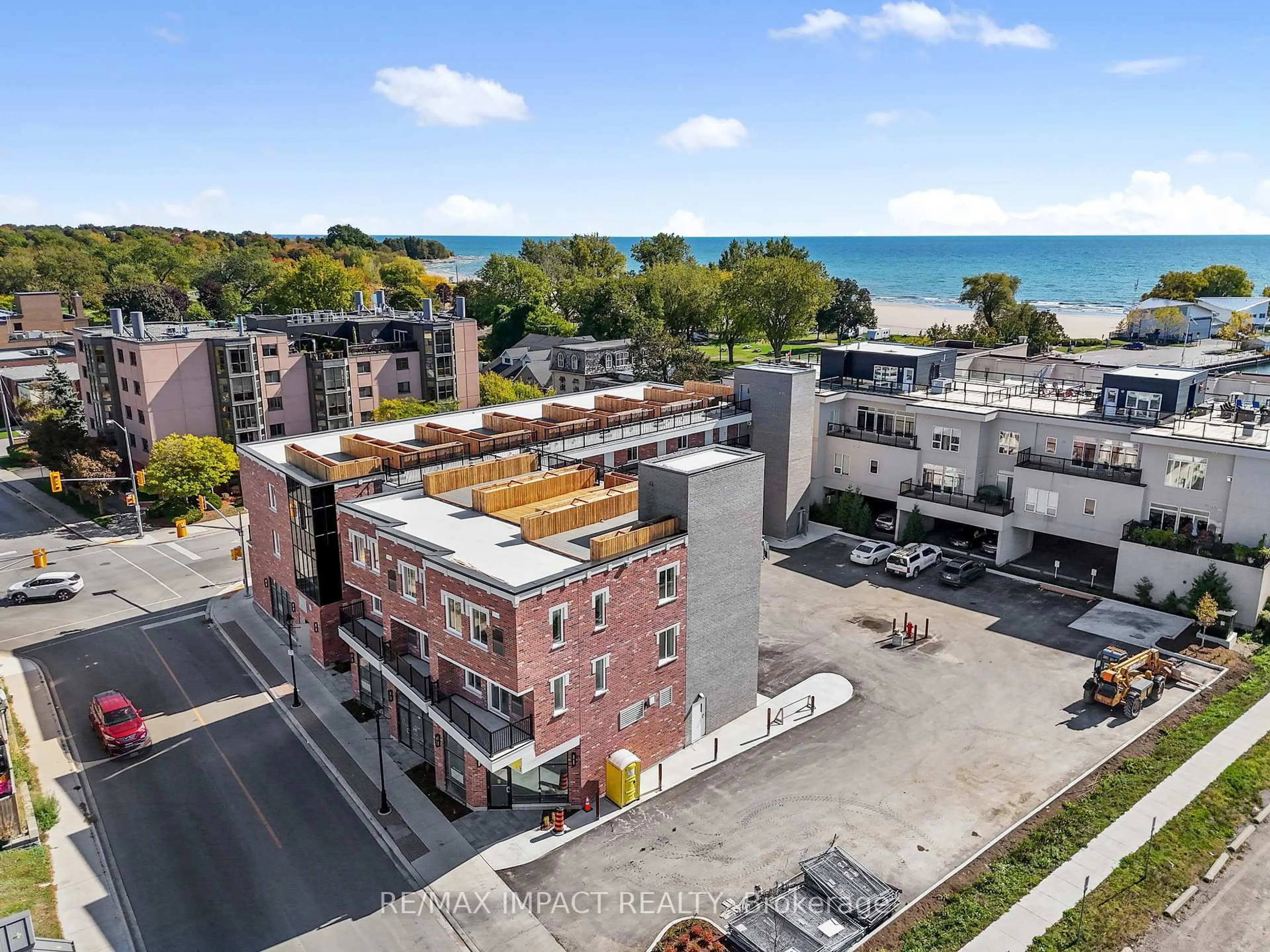 A pic from outside/outdoor area/front of a property/back of a property/a pic from drone, city buildings view from balcony for 185 Division St #108, 208, 308, Cobourg Ontario K9A 4M4