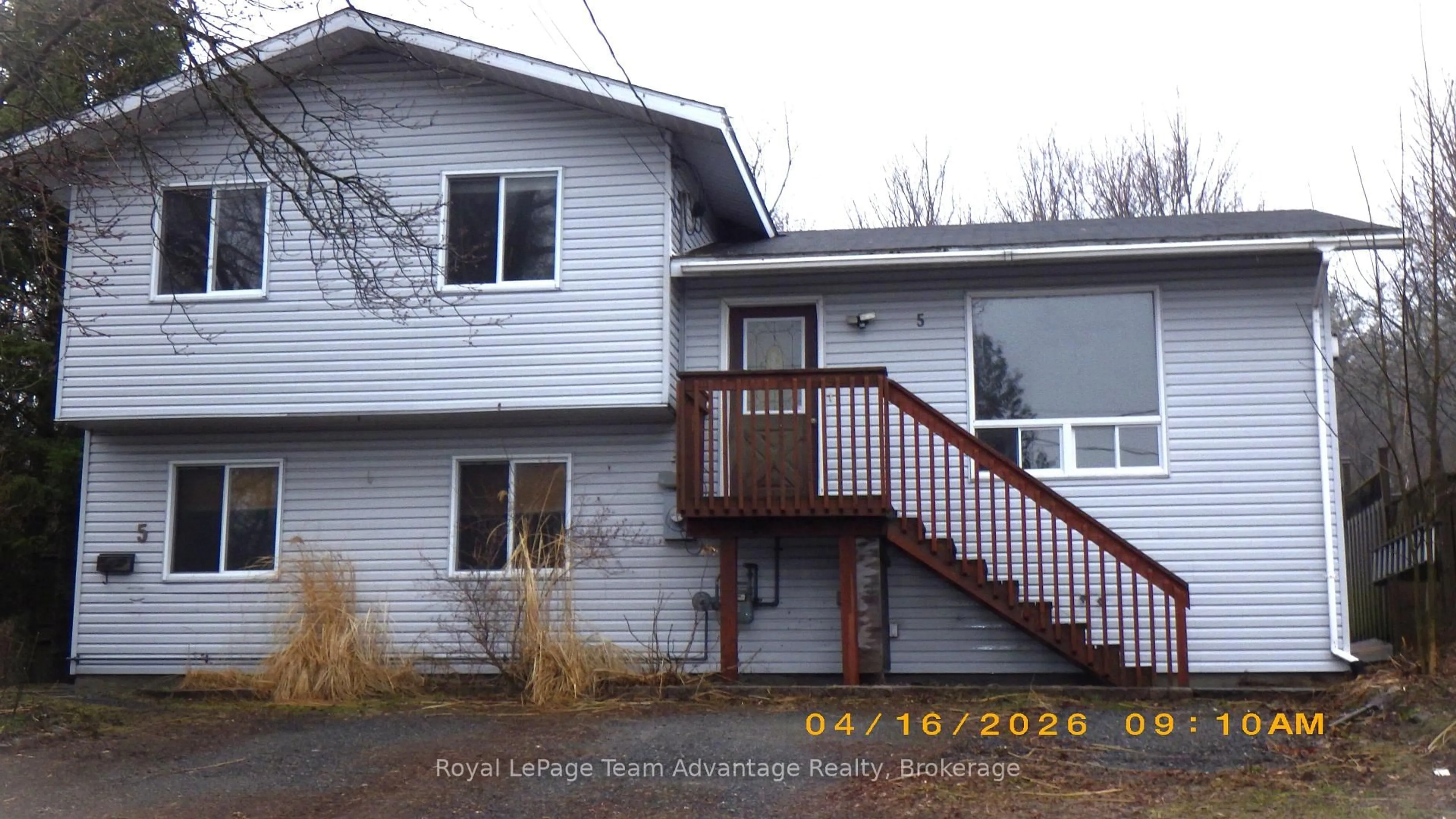 Home with vinyl exterior material, street for 5 Logans Lane, Parry Sound Ontario P2A 1H3