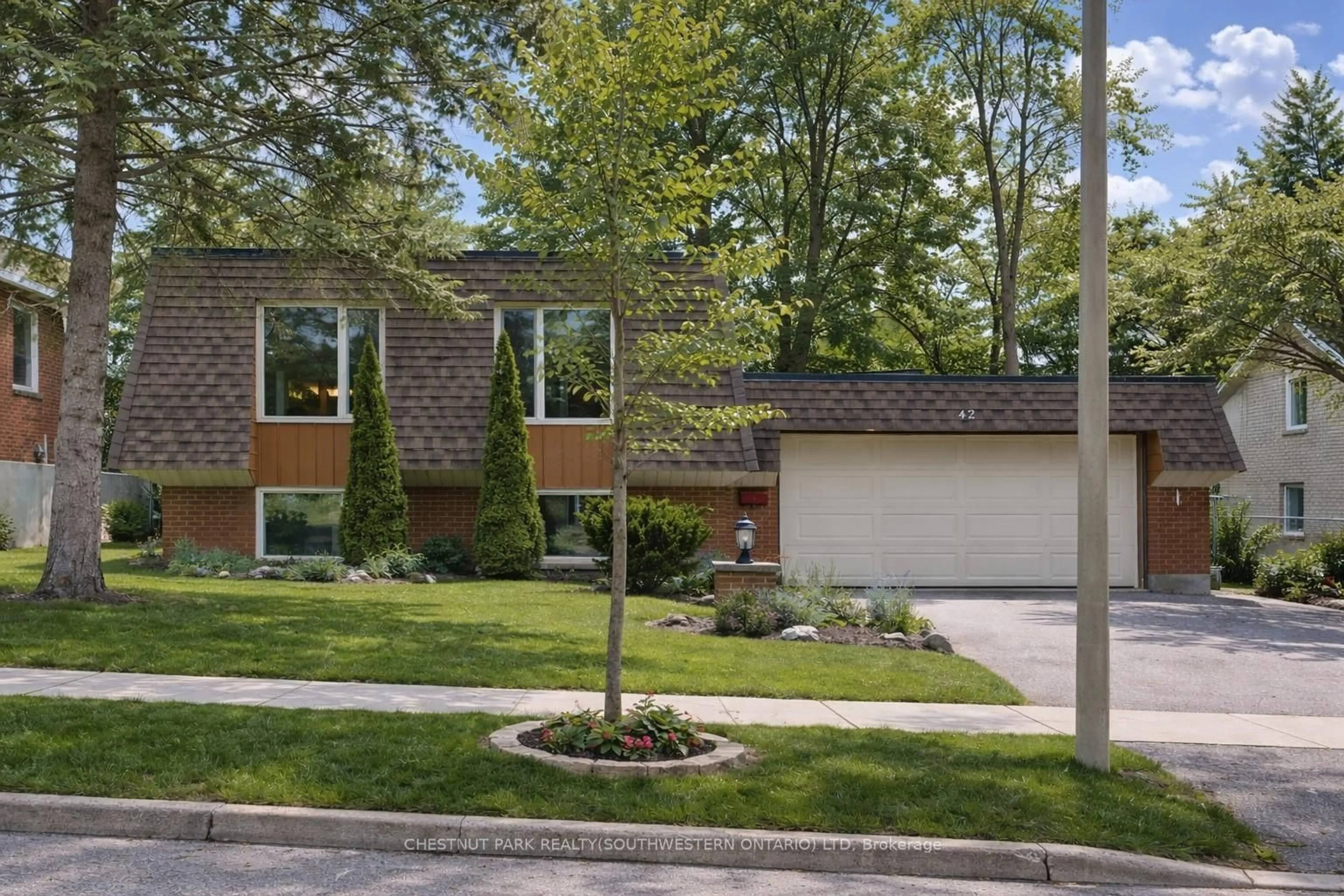 Home with brick exterior material, street for 42 Culpepper Dr, Waterloo Ontario N2L 5L1